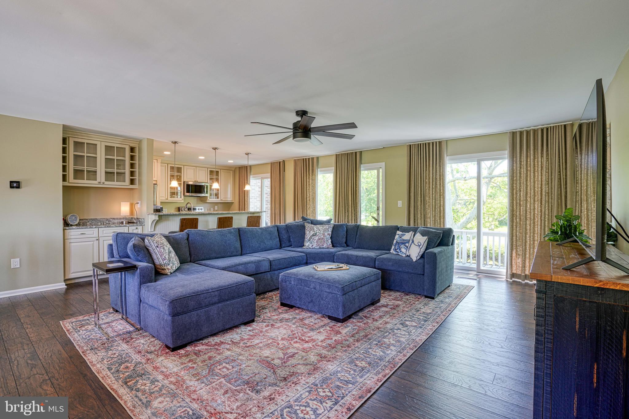 Situated in the established community of Martingham, and surrounded by the Links at Perry Cabin golf course, this beautifully updated 2-bedroom, 2.5 bath townhome has been thoughtfully renovated with an emphasis on quality craftsmanship, energy efficiency, and long-term durability.  The redesigned open floor plan creates a seamless flow throughout the main living areas, complemented by updated cabinetry, granite countertops, and stainless steel appliances in the kitchen.

All three bathrooms have been refreshed with new vanities, fixtures, and finishes, offering a clean and modern feel throughout the home.  Beyond the cosmetic updates, extensive infrastructure improvements provide peace of mind, including a newer HVAC, upgraded electrical panel, full outlet and switch replacement and enhanced attic efficiency with resealing and R49 insulation installation.

Interior finishes have been completely reimagined and updated throughout, including new luxury vinyl plank flooring on the upper level and premium Mohawk carpeting with upgraded padding in the lower bedrooms and on the stairwell (2024).  Fresh interior paint throughout the home, along with meticulous restoration of original doors - stripped, primed, and repainted with all new hardware installed in 2024 - add to the home's character and detail.

Additional improvements include a new washer and dryer (2024), new sliding glass doors in the bedrooms, and a 60-inch Hunter ceiling fan in the great room.  A stand out feature of this unit is the expanded floor plan, offering a more open, functional, and  spacious living area not commonly found in similar units.

The HOA recently completed significant improvements, including a new roof, decking replacements, and new gutters in 2025.  Completely turnkey and thoughtfully upgraded make this property ideal as a full-time residence, weekend retreat or investment property.