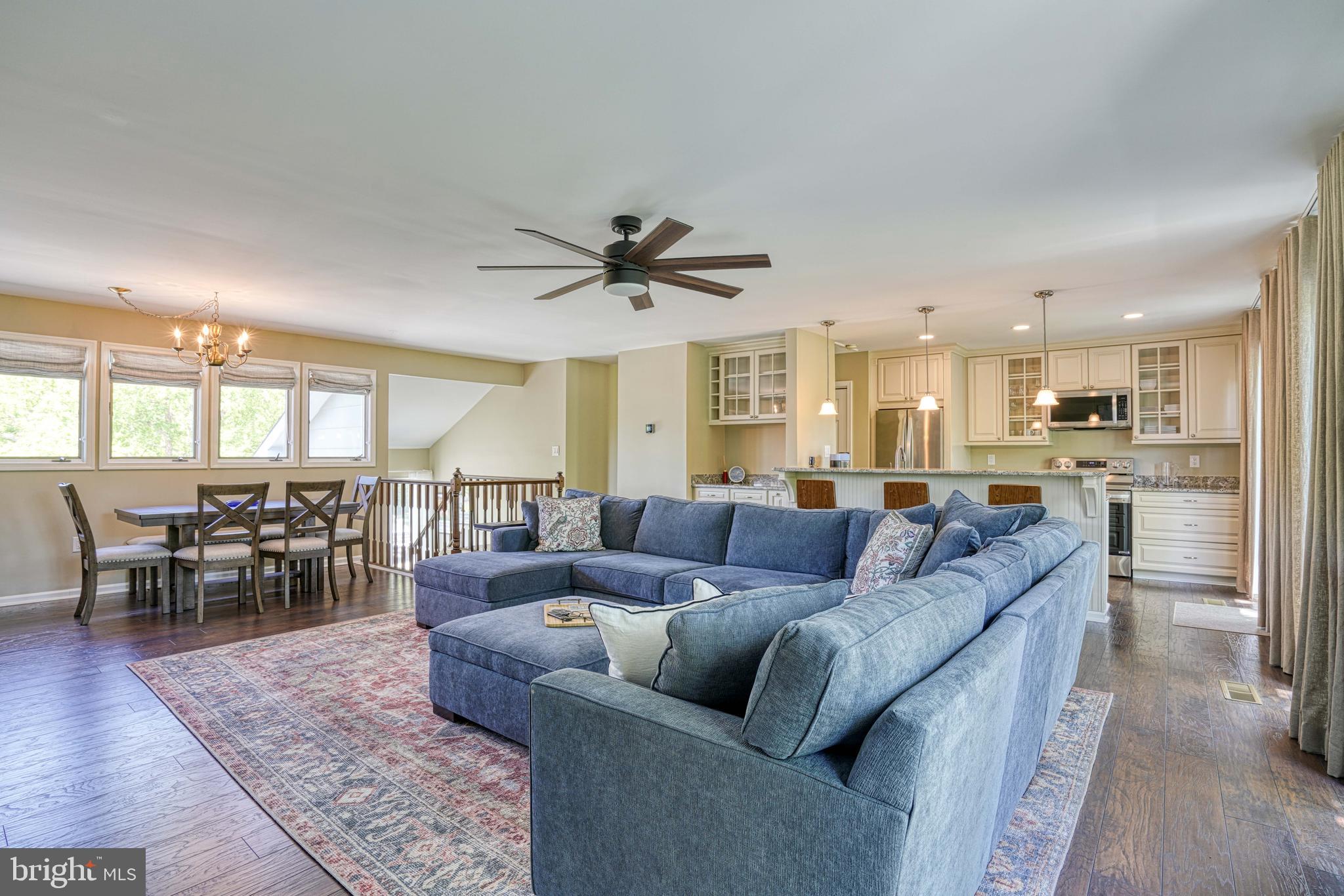 Situated in the established community of Martingham, and surrounded by the Links at Perry Cabin golf course, this beautifully updated 2-bedroom, 2.5 bath townhome has been thoughtfully renovated with an emphasis on quality craftsmanship, energy efficiency, and long-term durability.  The redesigned open floor plan creates a seamless flow throughout the main living areas, complemented by updated cabinetry, granite countertops, and stainless steel appliances in the kitchen.

All three bathrooms have been refreshed with new vanities, fixtures, and finishes, offering a clean and modern feel throughout the home.  Beyond the cosmetic updates, extensive infrastructure improvements provide peace of mind, including a newer HVAC, upgraded electrical panel, full outlet and switch replacement and enhanced attic efficiency with resealing and R49 insulation installation.

Interior finishes have been completely reimagined and updated throughout, including new luxury vinyl plank flooring on the upper level and premium Mohawk carpeting with upgraded padding in the lower bedrooms and on the stairwell (2024).  Fresh interior paint throughout the home, along with meticulous restoration of original doors - stripped, primed, and repainted with all new hardware installed in 2024 - add to the home's character and detail.

Additional improvements include a new washer and dryer (2024), new sliding glass doors in the bedrooms, and a 60-inch Hunter ceiling fan in the great room.  A stand out feature of this unit is the expanded floor plan, offering a more open, functional, and  spacious living area not commonly found in similar units.

The HOA recently completed significant improvements, including a new roof, decking replacements, and new gutters in 2025.  Completely turnkey and thoughtfully upgraded make this property ideal as a full-time residence, weekend retreat or investment property.
