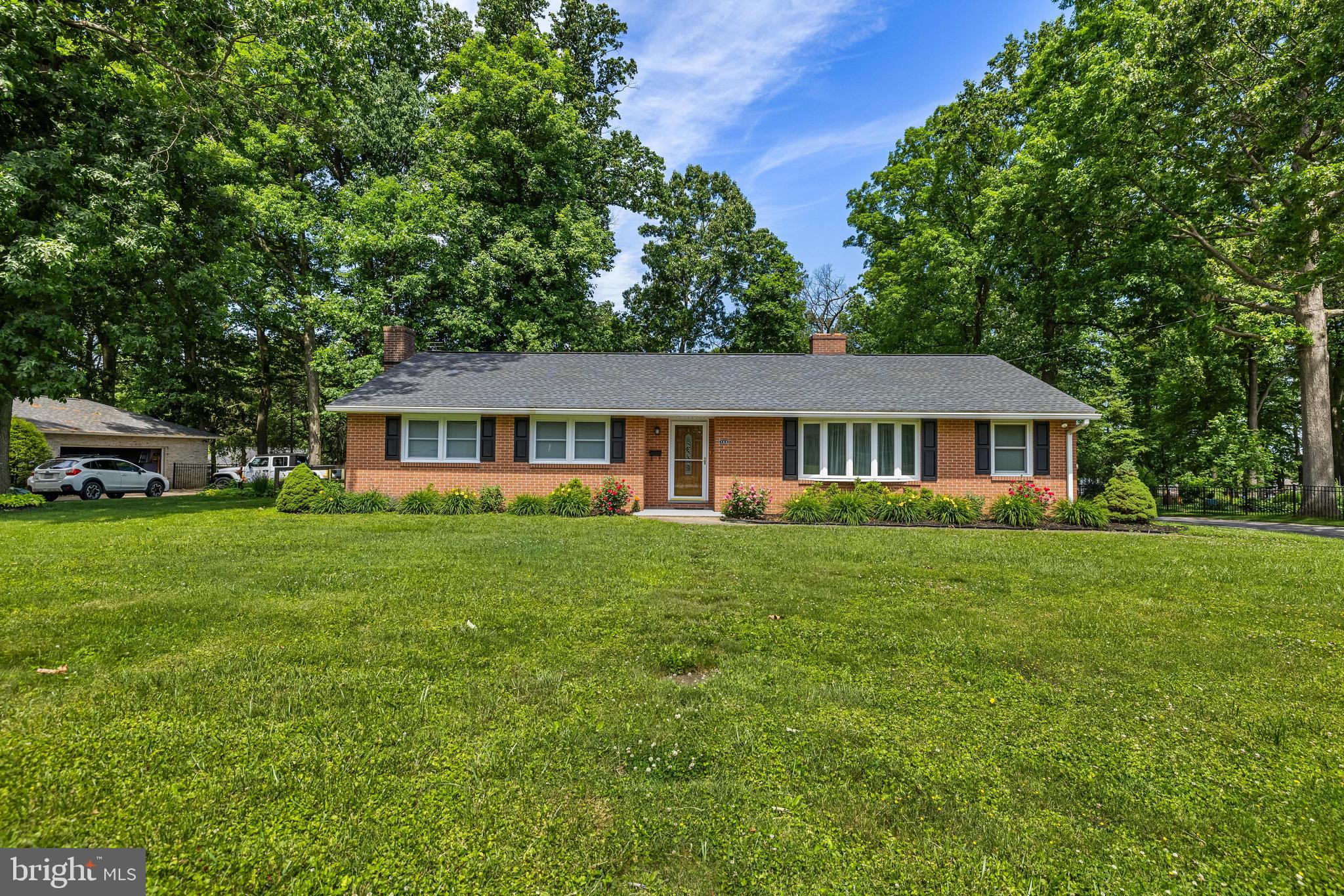 Wow. Wow. Wow. Welcome home to 100 Freedom Ave, a 3 bed 3 full bath meticulously maintained and thoughtfully updated 3,000  sqft Brick rancher- the kind of rancher you see for sale once every 6 months. Hardwoods throughout the majority of the main floor- some covered by carpet- but the exposed has been refinished. Ample space to spread out and enjoy your home. 2 car garage off the side. Large fenced in back yard. Conveniently located minutes to I83, making this the perfect commuters property- also close by all major conveniences. More details and photos coming soon. Schedule your private showing today- showings start 6/4!