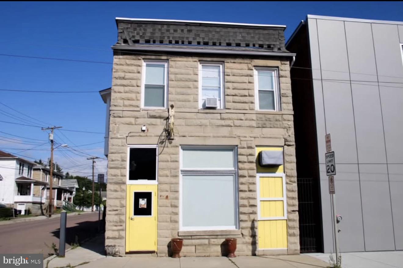 INVESTMENT ALERT! 
This historical commercial property presents a unique investment opportunity. Just blocks from Downtown Frostburg, this property is strategically positioned for maximum visibility and accessibility. Commercial store front with two one-bedroom apartments upstairs.