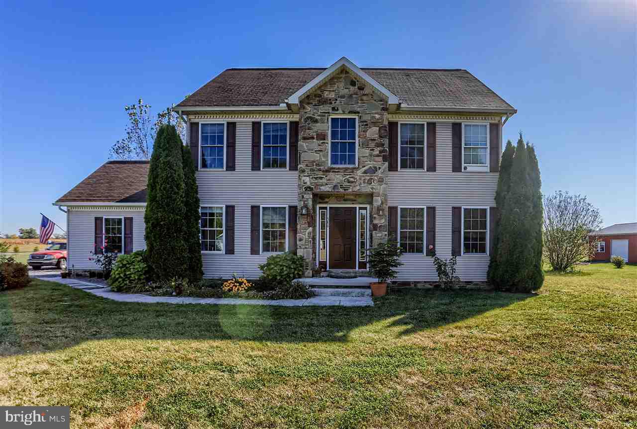 Stately 2 story colonial on 6.49 acres surrounded by farmland plus many fruit trees. 24X36 Barn w/ electric, 10' door, & 2 service doors, Greenhouse, Chicken Coop & Shed. 2 story foyer entrance w/ hardwood flooring. Living Rm/Office w/ interior french doors. Kitchen features breakfast bar & eat-in area plus all appliances. Composite deck & fenced in area (perfect for children & pets)  Hardwood steps lead to bedrooms w/ durable laminate flooring