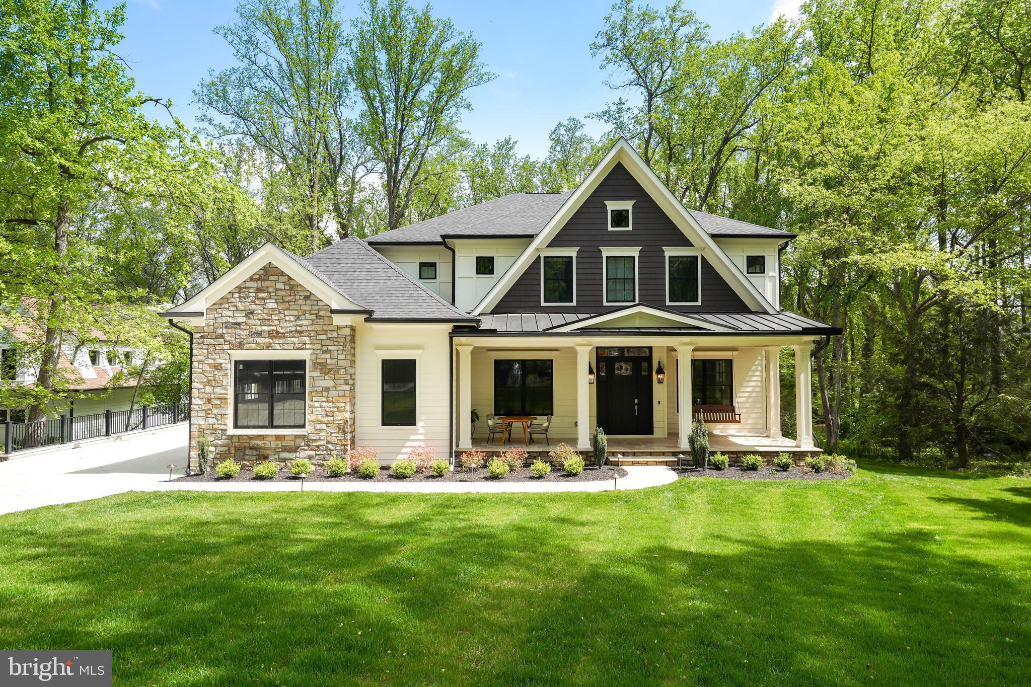 A masterpiece of design and craftsmanship, with exotic finishes and luxurious details built in 2021 is just a year old! Located in the highly desirable River Oaks neighborhood this light filled floor plan is designed for today’s living and entertaining. Elegant Foyer opens to the formal Living and Dining Room. Stunning Family Room has a fireplace and a wall of windows and French doors that lead to the expansive Deck that overlooks the serene pasture and has a gas fire pit and gas line for grill. Magnificent gourmet Kitchen with a striking center island, Silestone Quartz countertop and backsplash, custom cabinets, top-of-the-line appliances , farmhouse sink and Breakfast Room. The Main Level also includes dedicated office/study with 12ft ceilings, private Main Level Bedroom with full Bath and a formal Powder Room. The Upper Level features the Owner’s Suite with 3 walk-in Closets, luxurious Bath with separate vanities, heated marble floors, jet tub and oversized shower. Additionally there are 3 private ensuites with tray ceilings, Laundry Room and Storage Room in the Upper Level. The walk-out Lower Level is a retreat complete with a Wet Bar, Recreation Room, Fitness Room, Media Room with tiered seating, Study with two built-in desks and an accommodating and soundproof Guest Suite that has a full Bath, Kitchenette and private entry. Additional features include a large flat backyard, 3- car Garage with 2 EV chargers, generator, elevator ready and just minutes to world class dining, grocery stores and the finest shopping in the Washington area!