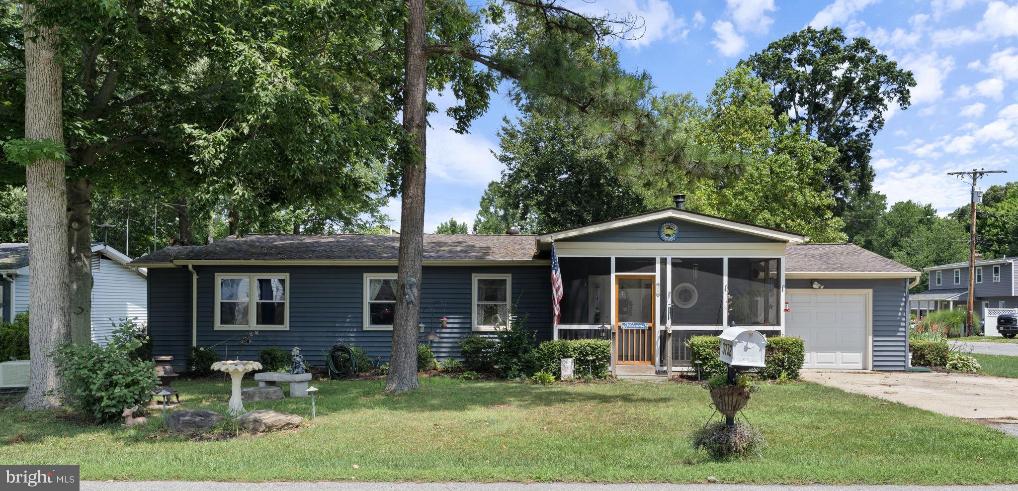 Welcome to 3732 8th St! Enjoy easy, one-level living in this completely refreshed 4-bedroom, 2-full-bathroom home, ideally located within walking distance to the Chesapeake Bay, beach, boardwalk, local shopping, and dining. The interior features a clean, updated aesthetic with a functional layout. The main living area includes a cozy wood stove, perfect for efficient winter heating. Four bedrooms offer flexibility for a dedicated home office, hobby space, or guest accommodations. Outside, the property offers a fenced backyard, a one-car garage ideal for parking a vehicle or storing beach gear, kayaks, and tools, and a detached shed equipped with electricity, ready to use as a workshop or extra storage. Turnkey and low-maintenance, this home is perfect as a full-time residence or a weekend retreat! Just a short walk to the boardwalk, beach, shops, restaurants, library, and so much more!