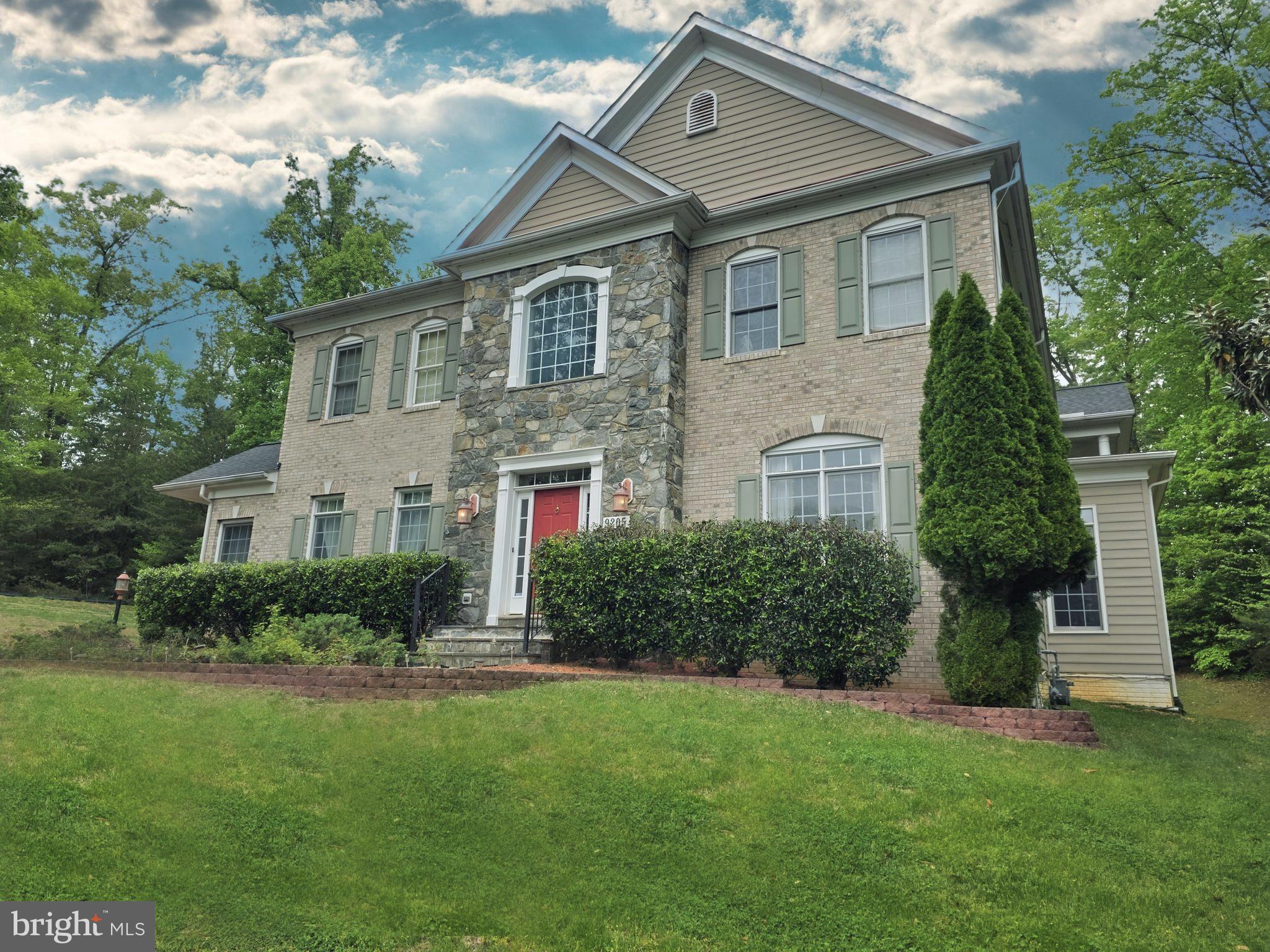 Former Executive Model Home.  5 bedroom / 7 bathroom, single family home.  7,291 finished  living area square feet.  At end of cul-de-sac, lots of privacy.  

Welcome to a former Model Home, 9205 Forest Greens Drive, a spectacular Colonial masterpiece tucked away on a quiet cul-de-sac in the sought-after Marovelli Forest community of Lorton, Virginia. Set back on nearly an acre of beautifully landscaped, tree-lined grounds, this home is a rare blend of serene seclusion and everyday convenience.

As you approach, the long, private driveway draws you in toward a timeless Colonial facade surrounded by lush greenery. Step inside the grand two-story foyer, where you’ll immediately sense the elegance and craftsmanship that define this home.   The home sports a richly detailed home office with custom crown molding offers a professional yet comfortable workspace. Entertain effortlessly in the spacious living room or step out onto the expansive deck overlooking your wooded backyard retreat—perfect for morning coffee or sunset gatherings.

All this, just minutes from commuter routes, shopping, dining, and top-rated schools. 9205 Forest Greens Drive isn’t just a home—it’s a lifestyle. Don’t miss your chance to experience luxury, privacy, and location in one extraordinary property.

Schedule your private showing today—before someone else does.

HOA only $50 per month.  Dual staircase.  Main floor has solid oak flooring.  Details are amazing as former Model Home has extensive ceiling moulding and wainscoating on walls.   Garage is side loading and very large at 21 feet x 20 feet.  Primary Bedroom has large Sitting Room and a orivate covered deck (15 ft x 14 ft).

Lots of recent home improvements total over $106K.
1). New roof, 3 years ago, and this is large home. $32,240
2). Both HVAC systems replaced, 4 years ago. $19,100
3). Septic system upgraded, and distribution box replaced 5 years
ago. $26,400
4). Basement windows replaced 2 years ago. $5,150
5). Basement repainted l2 years ago. $4,600
6). Installed in Basement new set of cabinets for storage, $ 1,800.
7). Installed additional set of washer & dryer for basement, $1,400
8). Added new electrical and plumbing for basement, $5,200
9). Installed self-closing metal door in the mechanical room that
meets fire code: $800.
10). Main floor repainted, $9,600