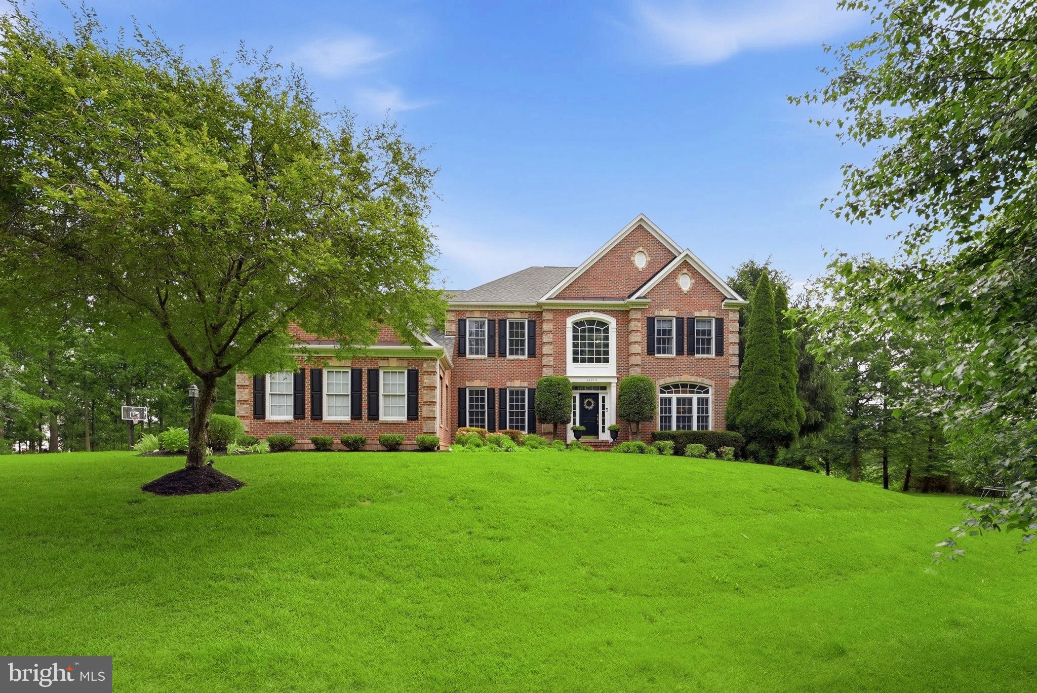 Nestled within the prestigious Piedmont community, this exquisite Colonial residence offers an unparalleled blend of luxury and comfort, set against a backdrop of serene wooded views on 1.23 acres. Spanning over 6,146 square feet, this meticulously maintained home is a true masterpiece, showcasing high-end finishes and thoughtful design throughout. Step inside to discover a grand foyer that welcomes you with rich hardwood flooring, sky high ceilings and elegant crown moldings. A formal living room greets you as well as a fully integrated seperate office and family room. The heart of the home is the gourmet kitchen, featuring upgraded countertops, a spacious island, and stainless steel appliances, including a double oven and a cooktop, perfect for culinary enthusiasts. The adjoining breakfast area and glassed in family room create an inviting space for gatherings, while the formal dining room, sets the stage for sophisticated entertaining. Five generously sized bedrooms, including a luxurious master suite with walk-in closets, soaking tub separate shower and vanities provide ample space for relaxation. The home boasts four full bathrooms and one half bath on the main floor, each designed with modern elegance in mind. The fully finished basement, complete with an outside entrance and walkout level, offers additional living space,  ideal for a home theater or recreation area. DOn't miss the 5th bedroom perfect for guests or a guest suite. Separate storage and full Gym complete this lower level.  The exterior of the property is equally impressive, featuring extensive hardscaping and a sport court, and an invisible fence for our furry family members; perfect for active lifestyles. Enjoy outdoor living on the expansive deck and patio, where you can unwind while surrounded by the tranquility of nature. The 1.23-acre lot, situated on a private cul-de-sac, backs to lush trees, ensuring privacy and a peaceful ambiance. As part of the Piedmont community, residents enjoy exclusive access to a wealth of amenities, including a state-of-the-art fitness center, indoor and outdoor pools, tennis courts, and a golf course with membership options. The community's security gate and well-maintained common areas provide peace of mind and a sense of belonging. Additional features include a three-car attached garage, a main floor laundry room, and a sprinkler system, enhancing the convenience and functionality of this stunning home. With its perfect blend of luxury, comfort, and lifestyle, this property is not just a home; it's a sanctuary where every detail has been thoughtfully curated for the discerning homeowner. Experience the epitome of upscale living in this remarkable residence...your dream home awaits.