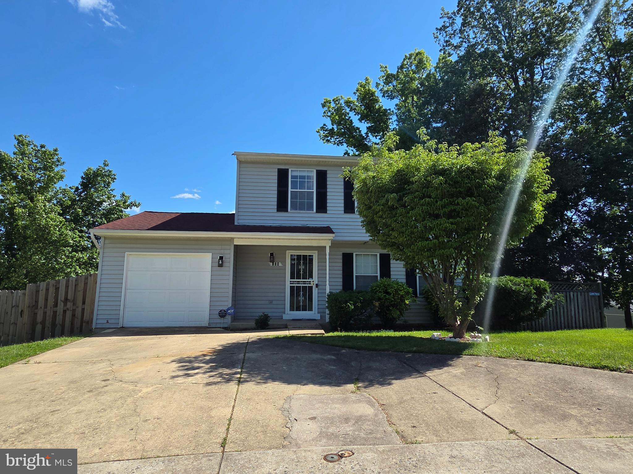 Charming detached Colonial-style home located on a quiet cul-de-sac, featuring a spacious two-level layout with a basement. This well-maintained property offers a traditional floor plan with recent updates including brand new flooring, paint and updated interior doors, giving the home a fresh, modern feel.

The exterior features a classic combination of brick and siding, along with a private driveway and attached one-car garage for convenient parking. The home sits on a generous lot with a fenced backyard, perfect for outdoor enjoyment and added privacy.

Conveniently located near major commuter routes, shopping, and local amenities, this home offers both comfort and accessibility.