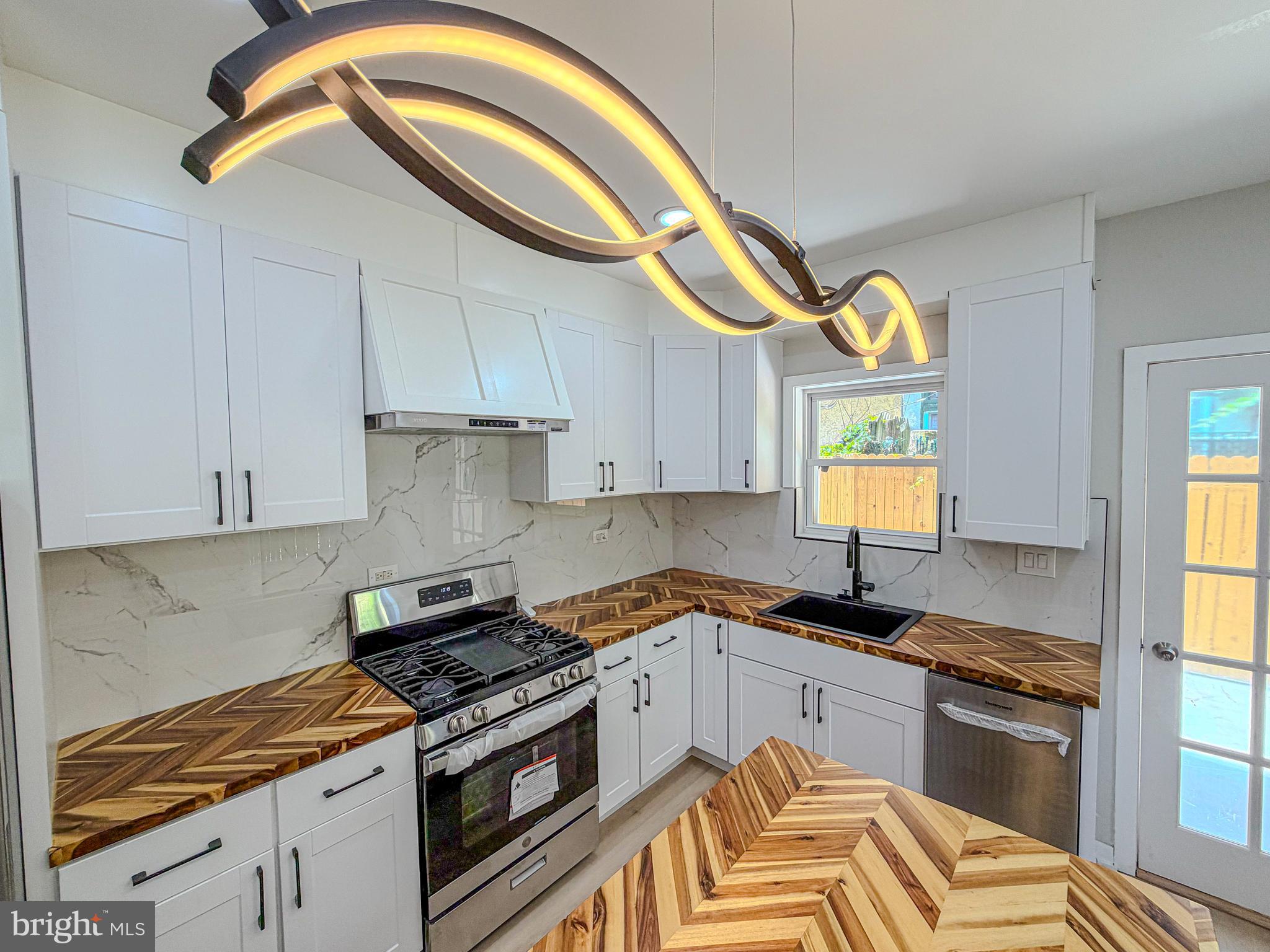 The city of Philadelphia is giving a $10,000 grant for first time home buyers. You may also qualify for a grant that is 5% of the purchase price. These grants are for closing cost and downpayment!

A beautifully renovated home offering modern finishes, thoughtful design, and an unbeatable Philadelphia location.
Step inside to an open-concept layout featuring gorgeous laminate flooring throughout the main level, creating a warm and inviting space perfect for both everyday living and entertaining. The kitchen is a true standout, showcasing elegant butcher block countertops, crisp white cabinetry, and an abundance of natural light that makes the space feel bright and airy.
For added convenience, the home features a half bathroom on the lower level—perfect for guests and maintaining privacy in the main bathroom. Upstairs, you’ll find well-appointed bedrooms with modern closets, a stylish full bathroom, and plenty of natural light in every room.
The fully finished basement provides additional living space, ideal for a media room, home office, or entertainment area.
Located just minutes from East Fairmount Park, Poplar Drive, and Kelly Drive, this home offers easy access to outdoor recreation and some of Philadelphia’s most iconic destinations. Hop in an Uber and be at the Philadelphia Museum of Art in under 10 minutes.
Whether you're looking for a primary residence or a smart investment, this move-in-ready home is a must-see.