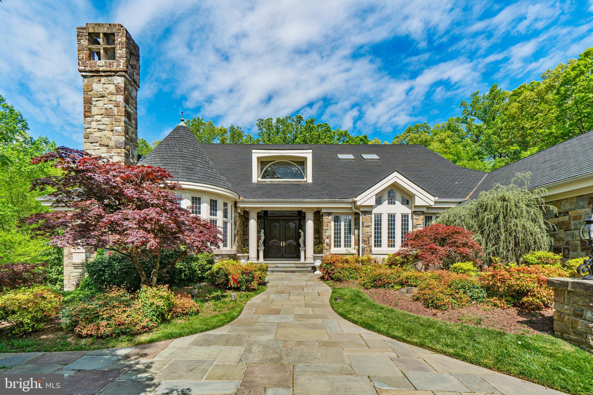 Have you dreamt of living like royalty? This is an incredibly rare opportunity to purchase an embassy style home in the prestigious neighborhood of Falconhurst, in highly sought after Potomac, Maryland.

Welcome to 10008 Bentcross Drive, where grandeur meets modern luxury. Designed with grand scale entertaining in mind, this stunning estate offers an unparalleled living experience. Here's what awaits you:

 Exquisite Exterior: As you approach, marvel at the impressive stone facade adorned with terraced stone walls. A stamped concrete circular driveway provides ample parking for your esteemed guests, while a grand turret and front portico reminiscent of a castle beckon you inside.

 Elegant Interiors: Step into the vaulted foyer, where rich intricate wood flooring and moldings greet you. A custom glass window bathes the entry in light, setting the tone for the majestic spaces that await. Embassy-sized entertaining areas flow seamlessly, perfect for hosting grand events while still exuding warmth for everyday living.  

Primary Suite Fit for Royalty: The main level boasts an incredibly spacious primary suite featuring a castle-style round sitting area and vaulted dome, framing a one of a kind imported antique  marble surround fireplace. The en suite bathroom and closet redefine luxury, with amenities including a kitchenette, laundry room, expansive double closets, oversized spa tub, and steam shower.

 Gourmet Kitchen: Love to gather and cook together? Indulge your culinary passions in the chef-quality kitchen, complete with a brand new Sub-Zero fridge, baking station, Wolfe gas range, and expansive island. It's the perfect centerpiece for culinary creativity and memorable gatherings.

 Seamless Indoor-Outdoor Living: The indoor spaces seamlessly blend into the gorgeous outdoor areas. Your heated indoor pool and spa feature a retractable roof and multiple sliding doors, offering the best of indoor and outdoor pool entertainment. Sweeping outdoor terraces overlook flowing waterfalls and two acres of serenity.  Dive into luxury and relaxation right at home.

Expansive lower level:  High ceilings, decorative wine cellar, a full kitchen and bar, and banks of windows with generous light allow for additional entertainment.  French doors lead to another generous private terrace.   Three  more expansive bedrooms with en suite baths await your family or guests.  Plenty of storage and other flexible space abound here.  

Don't miss this rare opportunity to own a piece of Potomac's finest. Live like royalty in the esteemed Falconhurst neighborhood at 10008 Bentcross Drive. Contact us today to schedule your private tour and experience the epitome of luxurious living.

Interior photos, floorplans, and videos coming soon.