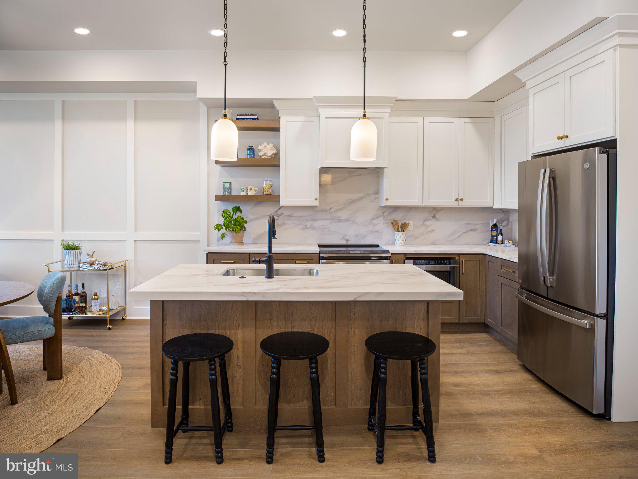 Introducing a Quick Delivery opportunity at Phoenix Crossing, a highly sought-after new luxury condominium community in the heart of Downtown Phoenixville. This beautifully designed 1-bedroom, 1 full bath residence offers an open-concept layout with soaring ceilings, oversized windows, and stunning natural light throughout. The thoughtfully designed floor plan provides ample space for both comfortable living and a dedicated dining area, making it ideal for entertaining or everyday living.

The gourmet kitchen is appointed with custom cabinetry, upgraded countertops, and premium stainless steel appliances—designed to be both stylish and highly functional. The modern designer bathroom showcases sleek finishes, contemporary vanities, high-end fixtures, and a frameless glass shower, delivering a refined and elevated feel. In-unit washer/dryer and elevator access add to the effortless convenience of Phoenix Crossing.

Beyond your private sanctuary, residents enjoy dedicated parking and ground-floor retail, enhancing everyday ease. Step outside and find yourself within walking distance of Phoenixville's best restaurants, breweries, coffee shops, and boutiques. Indulge in local favorites like Iron Hill Brewery, Bistro on Bridge, and Black Lab Bistro, or catch a show at the historic Colonial Theatre.

For outdoor enthusiasts, the Schuylkill River Trail—just steps from your door—offers endless biking, jogging, and scenic walks, while Valley Forge National Historical Park is only a short drive away.

Phoenix Crossing is more than a home—it’s a remarkable living experience in one of the region’s most vibrant and sought-after communities. Don’t miss your opportunity to own in this exceptional new development. Images are of the model home.