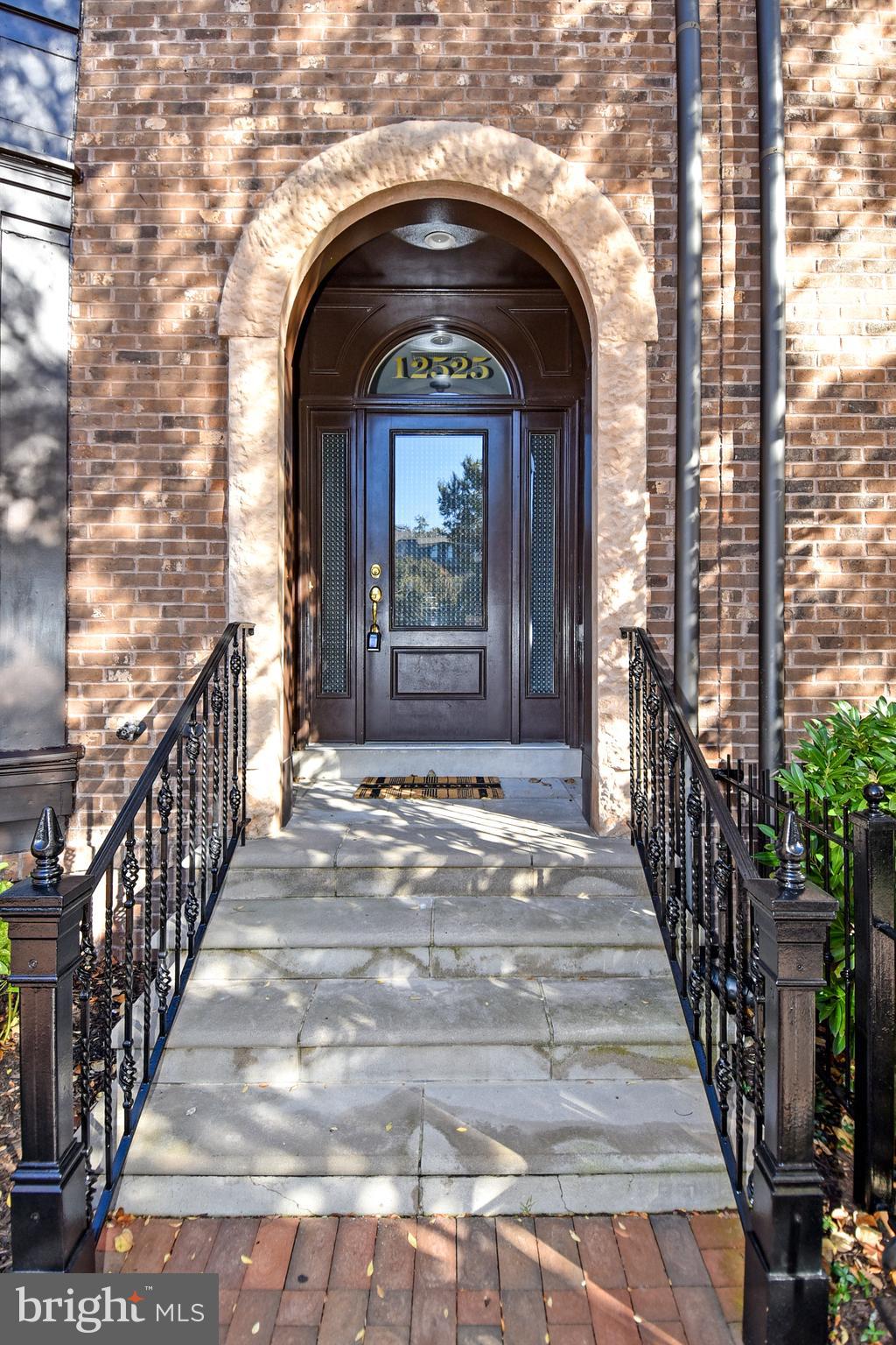 Welcome to 12525 Linda View Lane! This award-winning Berkeley model New York-style Brownstone home is situated perfectly on a quiet street across from the sparkling & refreshing community pool, with easy parking in one of the best locations within the fabulous Park Potomac community! Named "Community of the Year" by both the MAME and GALA Awards.  Impeccable design features with no detail overlooked-this sophisticated 5 Bedroom, 4.5 Bathroom, 26" wide townhome has over 4,300 square feet of spacious light-filled space on 4 fully finished levels with a private Elevator, ceilings that soar, recessed and art lighting, custom closets and built-ins, designer window treatments, California shutters throughout, useful storage space, and custom built-ins throughout! Enter this extraordinary home to find a welcoming and elegant entry-level Foyer. The 5th bedroom at the Entrance level is flooded with light from the bay window.   A spacious  Home Office with quality built-in bookcases and cabinets, a full Bathroom, 2 storage closets, an elevator, and access to a large 2-car garage with a handicap lift complete this level. Ascend the craftsman staircase to discover a Formal Living Room and a Small Sitting Room that does not disappoint, with walls of windows, graceful moldings, and modern lighting. The built-in in the large Kitchen and Family Room area with lighting  plus convenient storage provide a great backdrop for decorative objects. A formal Dining area is perfect for an impressive dinner party exuding the epitome of grace and elegance. The gourmet Kitchen will inspire awe with premium countertops, pull-out drawers, a Viking range, stainless steel appliances, ample cabinetry, a pantry, and a center island fit for a chef! The Kitchen opens to the luminous Family Room with a gas fireplace, with granite countertops, and walk out to the upgraded synthetic deck. Enjoy the peaceful summer breeze and morning sun while enjoying your morning cup of coffee. A powder room completes this generous level of wonderful living and entertaining space. Explore further to the 3rd Level where you meet a gracious Primary Suite with a fantastic closet room, custom-designed for this Suite. The Primary Bath offers a separate soaking tub and oversized shower. You will love having a top-of-the-line washer and dryer right outside your bedroom door in a spacious Laundry Room! Two additional Bedrooms and a Full Bath complete this level. The 4th Level is where the fun happens with plenty of space to enjoy time with friends & family! This Loft Space features a  charming 4th Bedroom, and full Bathroom, making it also a great option for Guests/ Au-pair/ Nanny living. A double-sided Gas fireplace and walkout to the large rooftop deck invite the best in entertaining on any scale while feeling on top of the world!   this convenient and unique development offers a variety of pleasures for a refined yet comfortable lifestyle with amenities galore including an exquisite mix of dining establishments, trendy shops, Harris Teeter, hiking trails, playgrounds, and is close to major commuter routes, Country Clubs, and more!