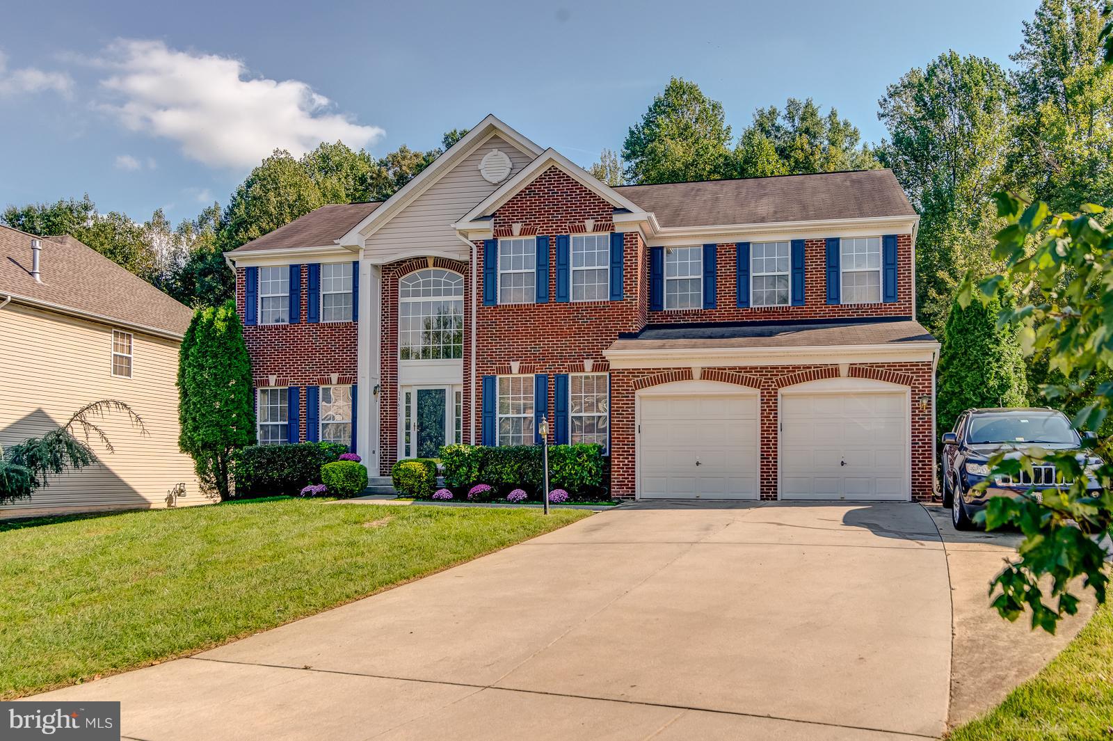 Gently lived in by the original owners, this spacious brick front Colonial has 4 good-sized bedrooms & 3-1/2 baths. The open floorplan starts off with a 2 story wood-floored Foyer, and French doors to the Study. The extra large Family Room has a gas fireplace with an attractive stone surround. The Kitchen opens to a sun-lit Morning Room. Hardwood floors unify the Foyer, Living Room, Dining Room, Study and Family Room.  There is carpet throughout the upstairs and basement. The Master Bedroom will fit your largest furniture with ease, & features a columned Sitting Room & two large walk-in closets. The Master Bath has a soaking tub & separate shower as well as his & her sinks. Head down to the walk-up basement & find plenty of room for relaxation & entertainment. There is a full bath already in place and the large unfinished area that is currently used as an exercise room, could easily be finished into additional living space.Beyond the house, you'll find you're just a short drive from the County Seat in Upper Marlboro in one direction & the shops & restaurants in Lanham in the other. Just a 9 minute drive to grocery shopping at Largo Plaza, 15 minutes to Costco, Wegmans & restaurants like Copper Canyon, and 9 minutes to Prince George's Community College with its new Culinary Arts Center, and 20 minutes from multiple shopping centers in Bowie.Need to get to Baltimore, Annapolis or into DC, or ready to head down the ocean to Ocean City? You're 15 minutes from 495, & in 20 you're on Route 50, headed for Ocean City, hon!Come check out 13613 Hollow Log Drive -- you'll be glad you did.