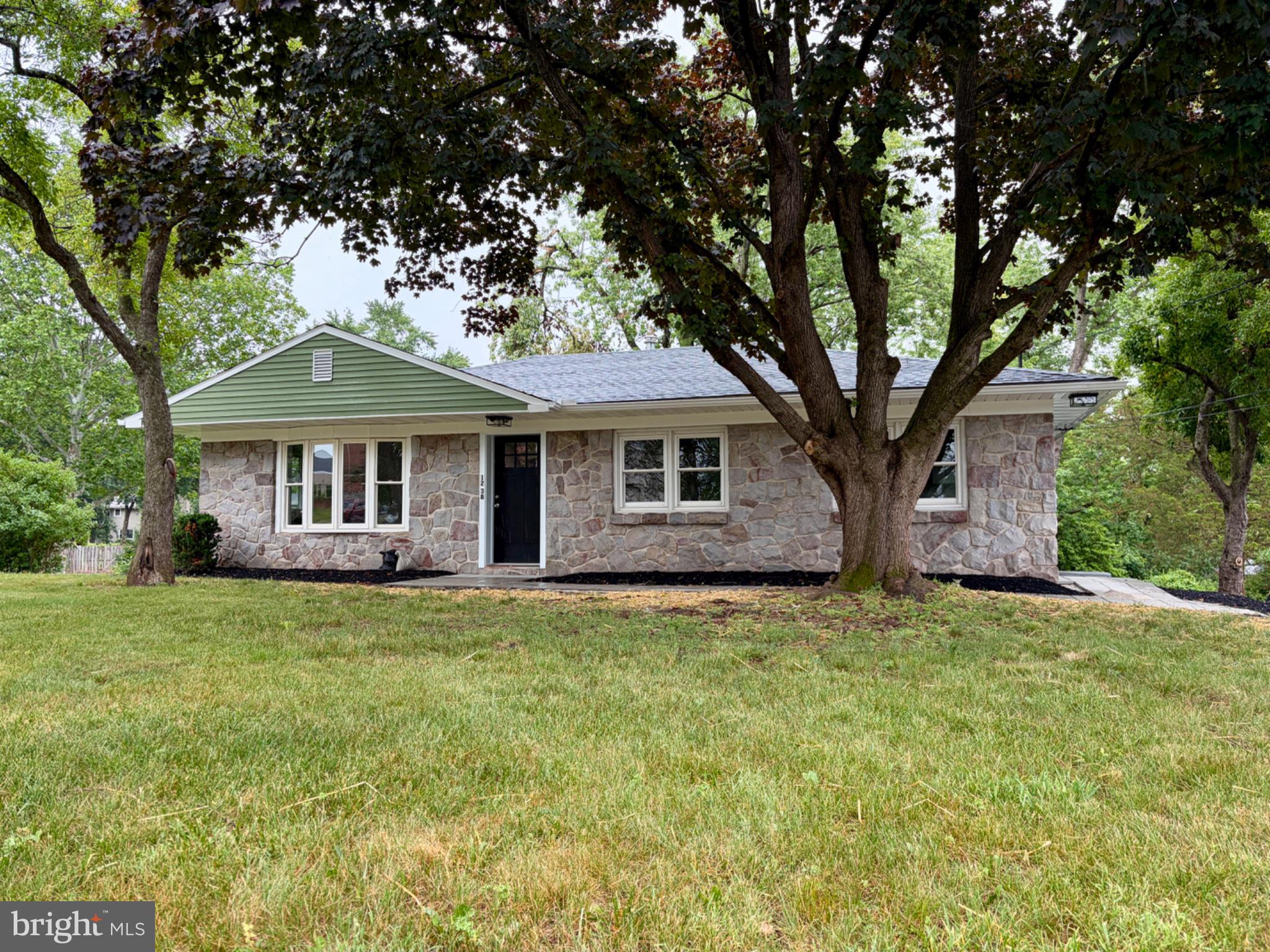 Welcome to 1238 Kauffman Rd, Pottstown! This beautifully renovated 4-bedroom, 2-bath home combines modern updates with timeless charm, offering move-in-ready living on a spacious lot with a large backyard perfect for entertaining, gardening, play, or simply enjoying the outdoors.



Step inside to discover a bright and inviting interior featuring new flooring, fresh paint, updated lighting, and stylish finishes throughout. The stunning kitchen serves as the heart of the home, showcasing white shaker cabinetry, granite countertops, stainless steel appliances, a center island, and a sleek range hood that creates both function and style.



Both full bathrooms have been tastefully remodeled with contemporary fixtures, elegant tile work, and modern vanities. Generously sized bedrooms provide comfortable living space, while the finished lower level offers additional flexibility for a family room, recreation area, home office, gym, or playroom.



Outside, the attractive stone façade and mature shade trees create excellent curb appeal, while the expansive backyard provides endless possibilities for outdoor enjoyment.



Conveniently located near shopping, dining, parks, and major commuting routes, this thoughtfully updated home offers the perfect blend of comfort, style, and practicality. Simply unpack and enjoy everything this exceptional property has to offer!
