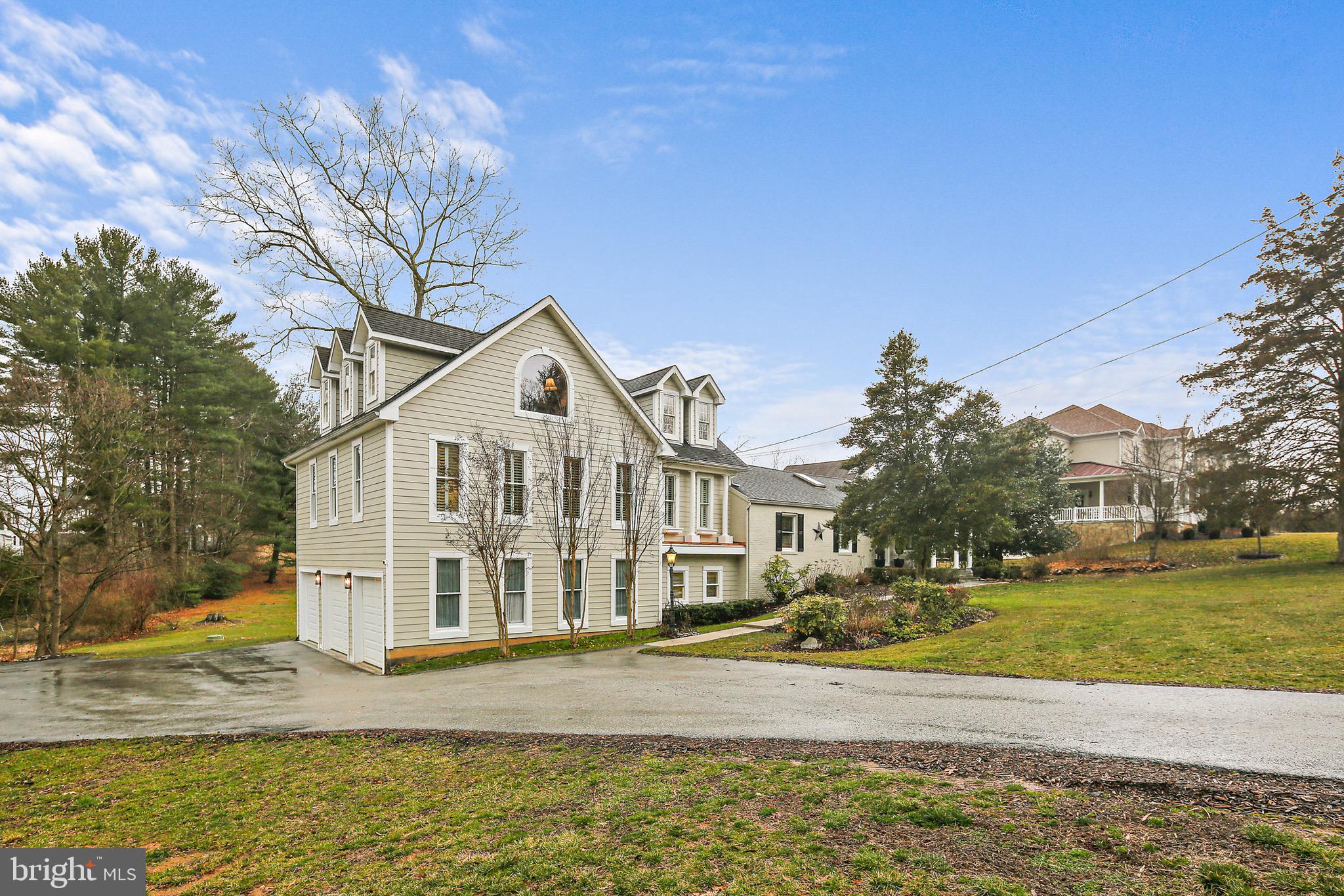 OPEN TODAY 1-3 PM

Clarksville charm awaits on Trotter Road!! Come and see this beautifully updated property in walking distance to River Hill high school!  The 4 bedroom, 3 full bath unique custom home includes an OVERSIZED 3 car garage situated back on a .50 acre! Walk into the gorgeous cathedral ceilings on the main level with skylights bringing plenty of light into the home! The newly lined Fireplaces include Jotel wood burning stoves with custom mantles to take the chill off of these brisk winter nights! The efficient kitchen offers a LARGE Viking Refrigerator, stainless steel appliances and well organized cabinet space with room to grow!! The main level also includes a large bedroom and full bath! Enter into the 3 story addition (built in 2005) that first features a cozy reading nook and additional storage space!! Check out the MASSIVE living room complete with GIANT Anderson Windows bringing in tons of sunlight!! The staircase leads up to the perfect office/playroom/potential bedroom that overlooks the living room!  Notice the recess lighting, beautiful dormers and skylights that offer additional light! Enter through the unique bedroom doors to the primary bedroom suite. Beautifully customized shutters surround the bedroom with 2 large walk in closets! The LARGE primary bathroom provides double sinks, large walk in shower, private toilet space and jetted tub! The lower level is yet another entertaining spot with a spacious family room, large island bar and newer kitchen space accompanied alongside 2 large bedrooms and an updated full bath! 3,000 sqft of custom brick flooring installed in 2022 with new carpet in one of the bedrooms installed in 2024. Don't forget to check out the OVERSIZED 3 car garage offering more than enough storage space!! The outside of the home brings an additional gathering location for your guests on the new 42x18 partially covered deck! New features include: NEW large resurfaced deck, NEW lower level flooring, Updated lower level full bath, NEW concrete lower patio, Freshly painted interior and exterior (2024) and so much more! Custom trim throughout!! NO HOA!! This home has been extremely well kept with character that you don't want to miss!! Howard County HAS SO MUCH TO OFFER...GREAT SCHOOLS, FABULOUS LIBRARIES, SPORTS PARKS and the best area for exploring HISTORIC ANNAPOLIS, WASHINGTON,DC or BALTIMORE!! Major SHOPPING, CASINOS & INCREDIBLE RESTAURANTS CLOSE BY!!! RT 100, RT 32, I-97 & I-95, 695 makes for an easy commute!! Come and see!!