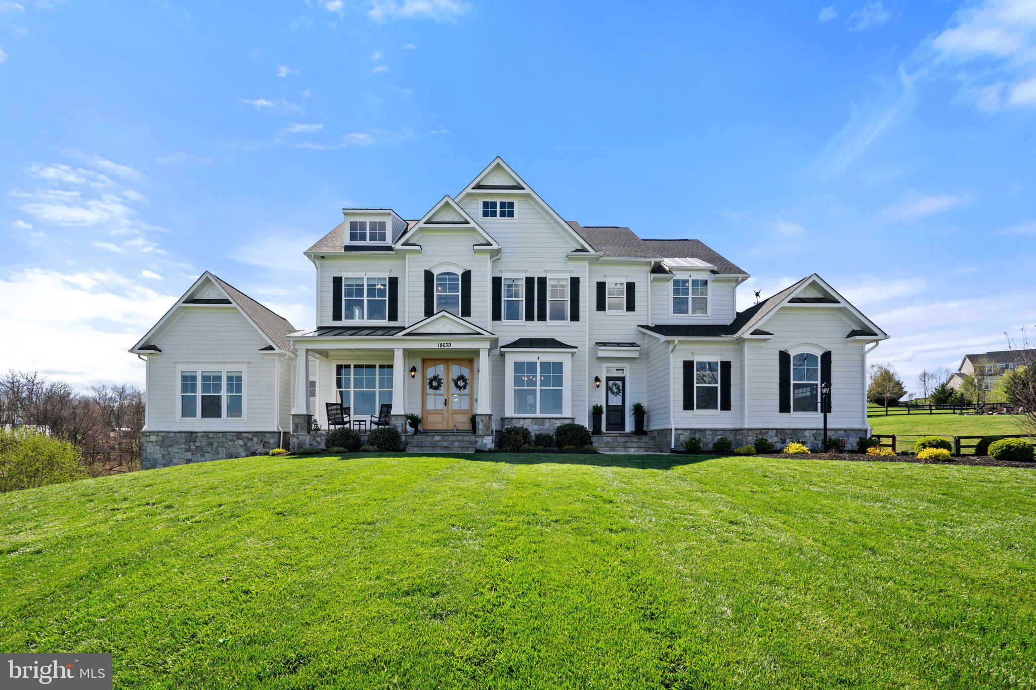 Stunning 6-Bedroom Modern Farmhouse on 10+ Acres with high-speed internet in the sought after community of Black Oak Ridge! You could say this property has it all.  This sprawling four year young Carrington home with 6-bedrooms and 6.5-bathrooms home sits on 10.56-acre lot with breathtaking views of the valley below and Blue Ridge Mountain beyond.  This property offers luxurious living in a country setting just minutes from shopping and restaurants in Purcellville, VA.  Congratulations, your search for the perfect home is over. 

Inside you'll be impressed with the open floor plan, large eat-in kitchen with massive center island. There is a billiards/club room as an added bonus on the main level.  A main level in-law suite with private bathroom and closets is perfect for family or guests who need a longer stay.  Upstairs you'll find generously sized bedrooms each with on-suite baths.  New carpet installed (2025). The lower level is mostly all finished space with walkout convenience and plenty of natural light. 

Outside, the large screened-in porch and attached deck offer ideal spaces to unwind outdoors, or gather friends at the  20' diameter stone patio with fire pit.    Animal lovers will appreciate the 3-board fencing with dog mesh, covering 4+ acres. The expansive backyard is fully fenced (6 acres), with invisible fencing over 2+ acres for extra security.   This lot is approved for horses by the HOA. 

This property is also a Conservancy Lot, offering privacy and beauty. Located in the serene countryside of Purcellville, this home offers a peaceful retreat in an elegant home, while remaining conveniently located near local amenities.  This is the home you've been dreaming about.  Schedule a private tour today.