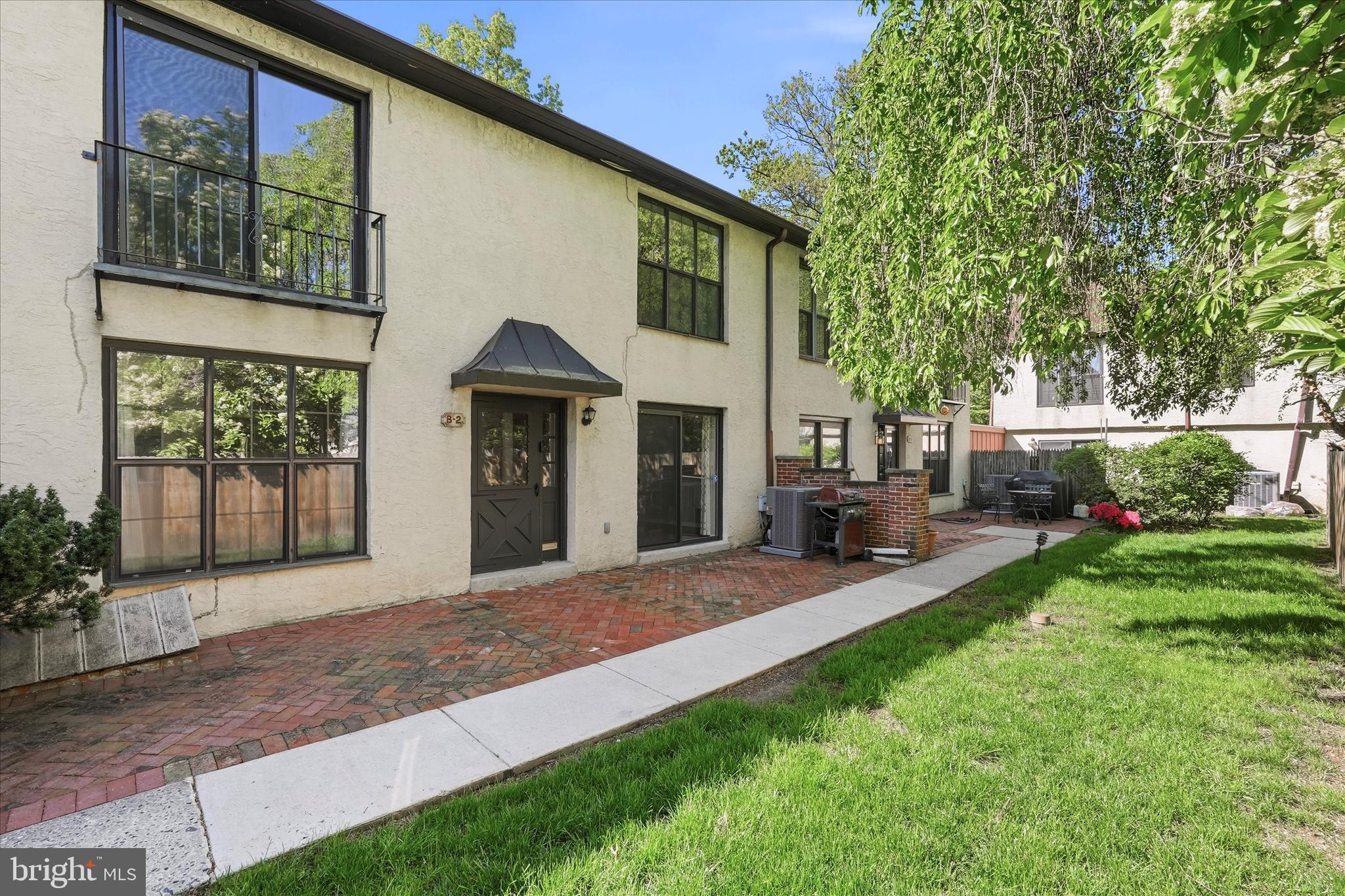Discover the perfect blend of charm and convenience in this 2-bedroom, 2.5-bathroom, 2-story townhome in Bala Cynwyd. The entrance to this unit is off the side street Bryn Mawr Ave, tucked on the quieter side of the complex. Lower Merion School District. Close to both Cynwyd Elementary and Bala Cynwyd Middle Schools. Inside, you’ll find a spacious, light-filled layout. The main floor features a welcoming foyer, a bright formal dining room, large living room and a kitchen with stainless steel appliances. The large living room opens to a private brick patio, perfect for entertaining or relaxing. A powder room, laundry room, and storage complete the main level. Upstairs, the primary suite with a ceiling fan, has sliding glass doors open to a Juliet balcony, large closet spaces, and an ensuite full bath. A generously sized second bedroom with ceiling fan and an updated hall bath offer plenty of flexibility and complete this level. With an indoor garage space, extra storage, and proximity to the Cynwyd train and Cynwyd heritage trail, Starbucks, and General Wayne Park, this home has it all. An unbeatable location near parks, trails, and easy access to Manayunk, Center City, Phila airport, shopping and highways. Don't miss your chance to experience Bala Cynwyd living at its finest!