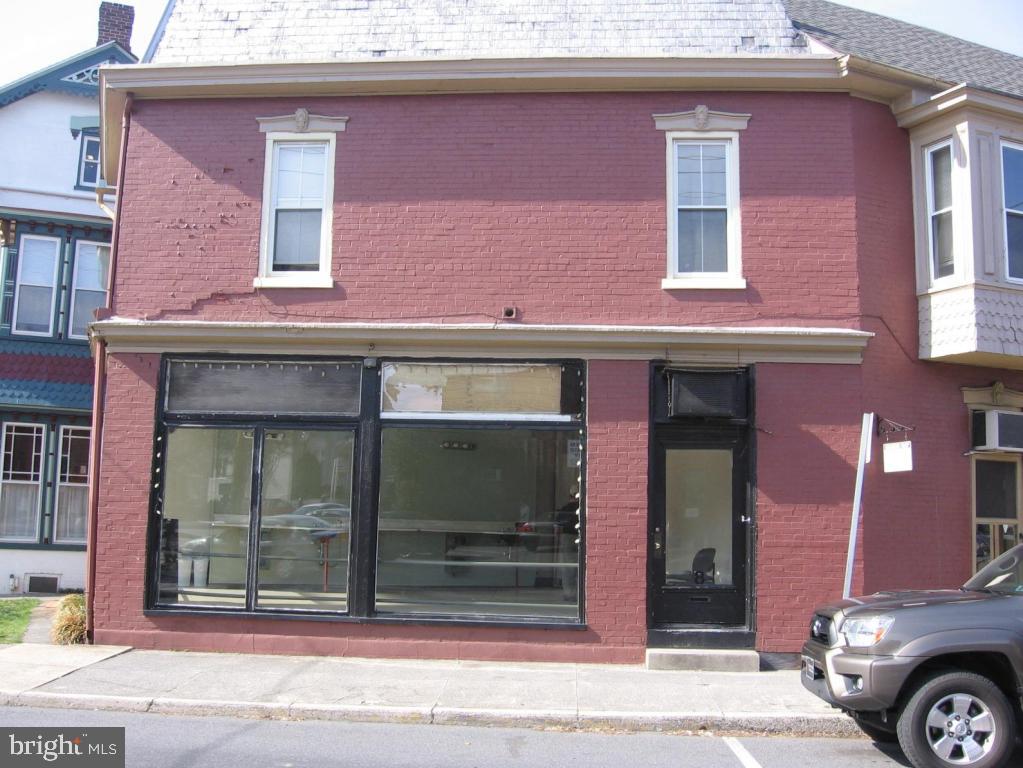 Convenient location for office or retail use. Large display windows.