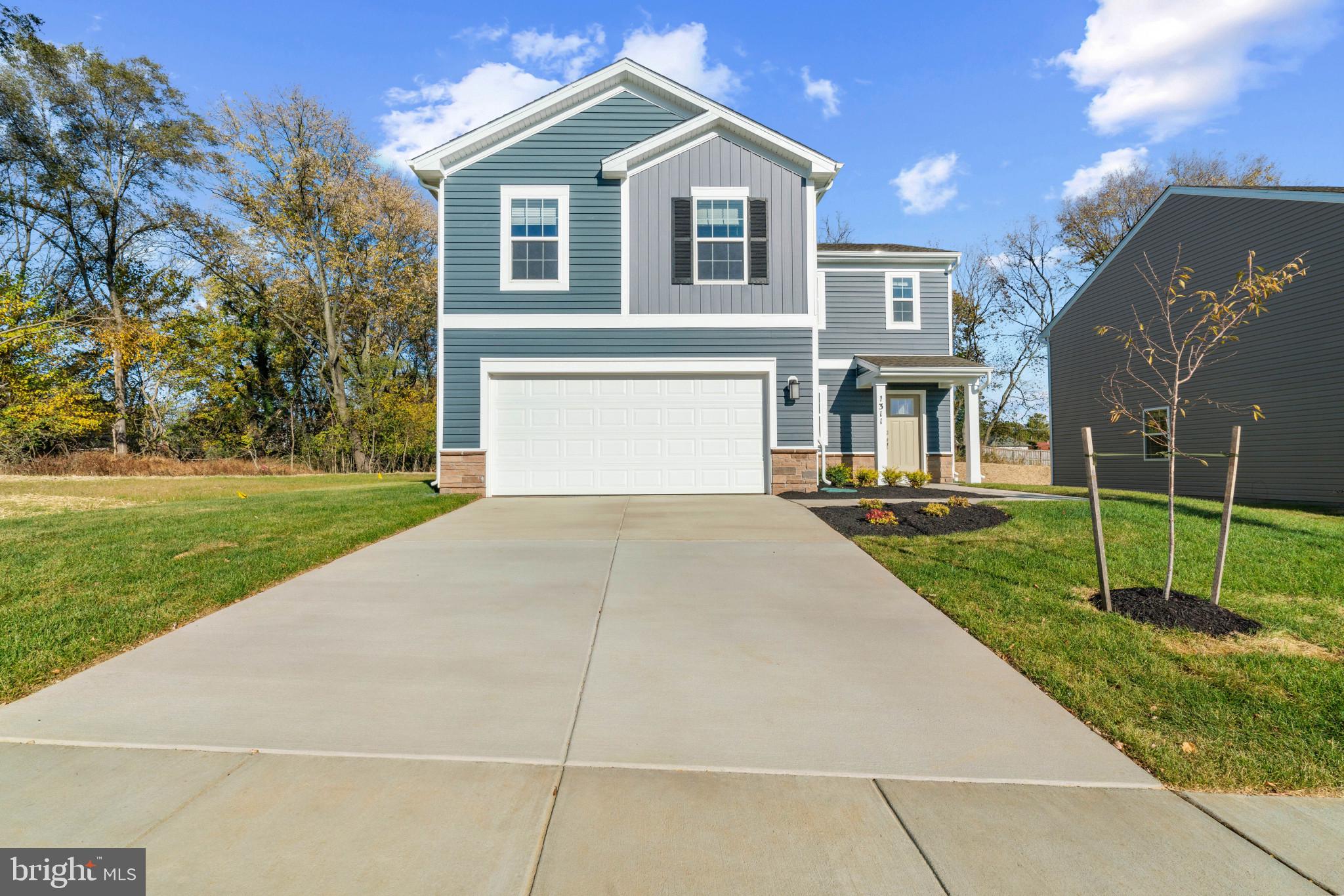 Welcome to the Deerfield plan in Virginia Commons! A thoughtfully designed two-story home offering over 1,900 sq ft, 4 bedrooms, 2.5 baths, and a 2-car garage. 
The open-concept main level is perfect for modern living, with a spacious great room flowing into the dining area and a stylish kitchen complete with a large island, quartz countertops, stainless steel appliances, and walk-in pantry.
Upstairs, all four bedrooms are privately situated, including a generous owner’s suite with walk-in closet and en-suite bath, plus the convenience of an upper-level laundry room.
Enjoy the ease of D.R. Horton’s Smart Home Package, allowing you to control key features right from your phone.
Located in the desirable Virginia Commons community, you’ll have quick access to I-70, Route 40, shopping, dining, and everyday conveniences perfect for commuters and busy lifestyles.
Take advantage of current incentives and make this beautiful new home yours. schedule your tour today!