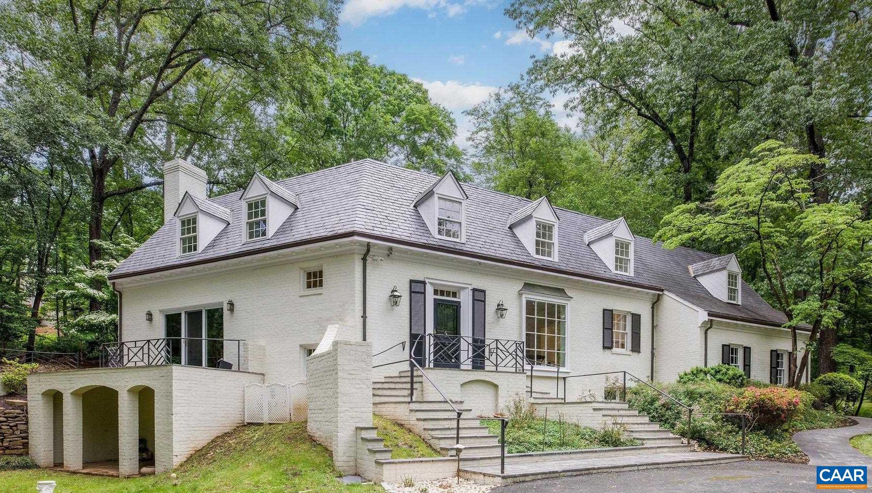 Open Saturday 2-4 and Sunday 12-2, this architecturally distinguished brick and slate Ednam Forest 4 bedroom/4 bath offers original charms paired with stunning, classic kitchen and bath renovations.  Now with beautiful hardwoods throughout, carrera marble bathrooms and kitchen, the home is 100% move-in ready.  Fireplaces in the living and family rooms, gracious slate-floored foyer, expansive bluestone rear terraces.  7 minute walk to Boar's Head Inn and Sports Club amenities.  Interior photos on May 15.  Showings commence 5/15 too.,Marble Counter,Painted Cabinets,Fireplace in Family Room,Fireplace in Living Room