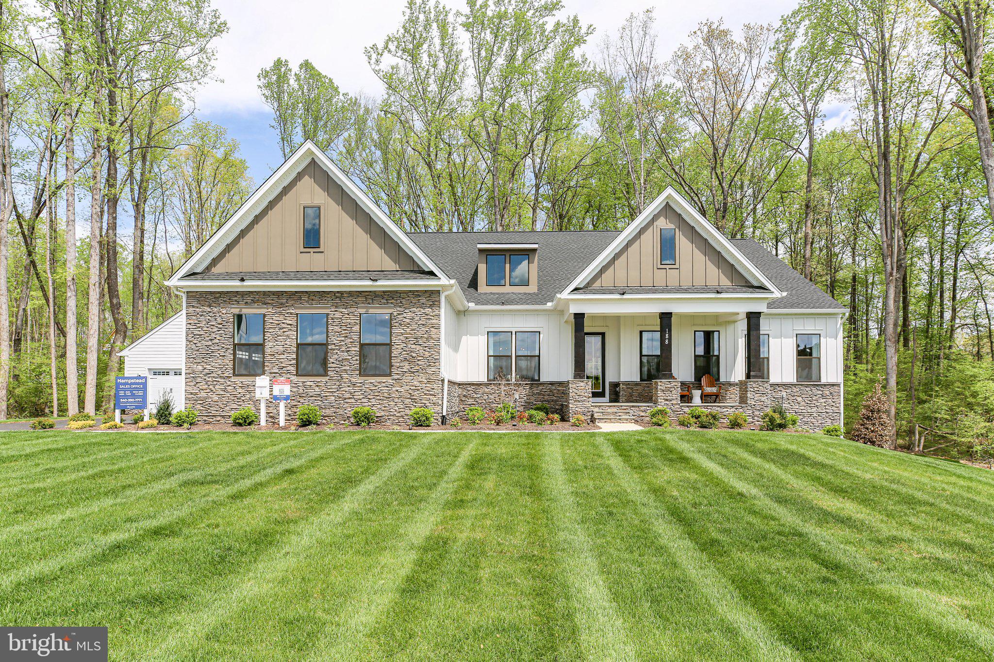 Welcome to your future dream home—this stunning modern farmhouse rambler sits on 10 private, serene acres with a fully stocked pond and no HOA restrictions. With a spring 2026 delivery, there's still time to make personalized design selections and truly make this home your own.

Offering 5,626 finished square feet—including 3,420 sq ft on the main level—this home features an open, functional layout with laminate flooring throughout, and Hardie Plank siding for lasting beauty and durability.

The heart of the home is the chef’s kitchen, complete with upgraded quartz countertops, ceiling-height cabinetry, and a professional 6-burner gas stove, making it ideal for entertaining and everyday living.

Enjoy 4 spacious bedrooms, 4.5 designer bathrooms, and a fully finished basement that provides additional space for a home theater, fitness room, or guest space.

The property also includes a 2-car attached garage plus a 2-car detached garage, offering ample storage for vehicles, hobbies, or outdoor gear.

Whether you’re casting a line in your private pond, relaxing on the porch, or customizing your finishes, this property blends modern luxury with countryside tranquility—without sacrificing freedom or style.

Photos are of model home, but are very similar to this home's current selections.
This home is To Be Built and still has the opportunity to make your own with designer selections.