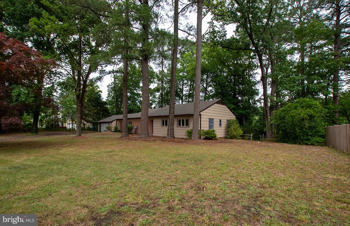 Professional Photographs to be uploaded soon!

Welcome to this beautifully updated waterfront home located on Leonard Mill Pond in the quiet residential neighborhood of Holly Lake Estates.  Classic charm meets modern comfort in this three bedroom, three bath residence which offers stunning water views through expansive waterfront windows that fill the home with natural light and showcase the tranquil surroundings. 

The heart of the home features custom cabinetry and thoughtfully updated living spaces designed for both everyday living and entertaining.  Relax year-round on the inviting screened porch complete with a wood burning fireplace, the perfect spot to enjoy peaceful mornings, cozy evenings and picturesque pond views. 

Additional highlights include a full basement providing ample storage and flexible space, an attached garage with an additional full bathroom.  The numerous unique architectural details set this property apart.  

Whether you are looking for a primary residence or a waterfront retreat, this property offers a rare opportunity to enjoy the beauty and serenity of Lenoard Mill Pond.