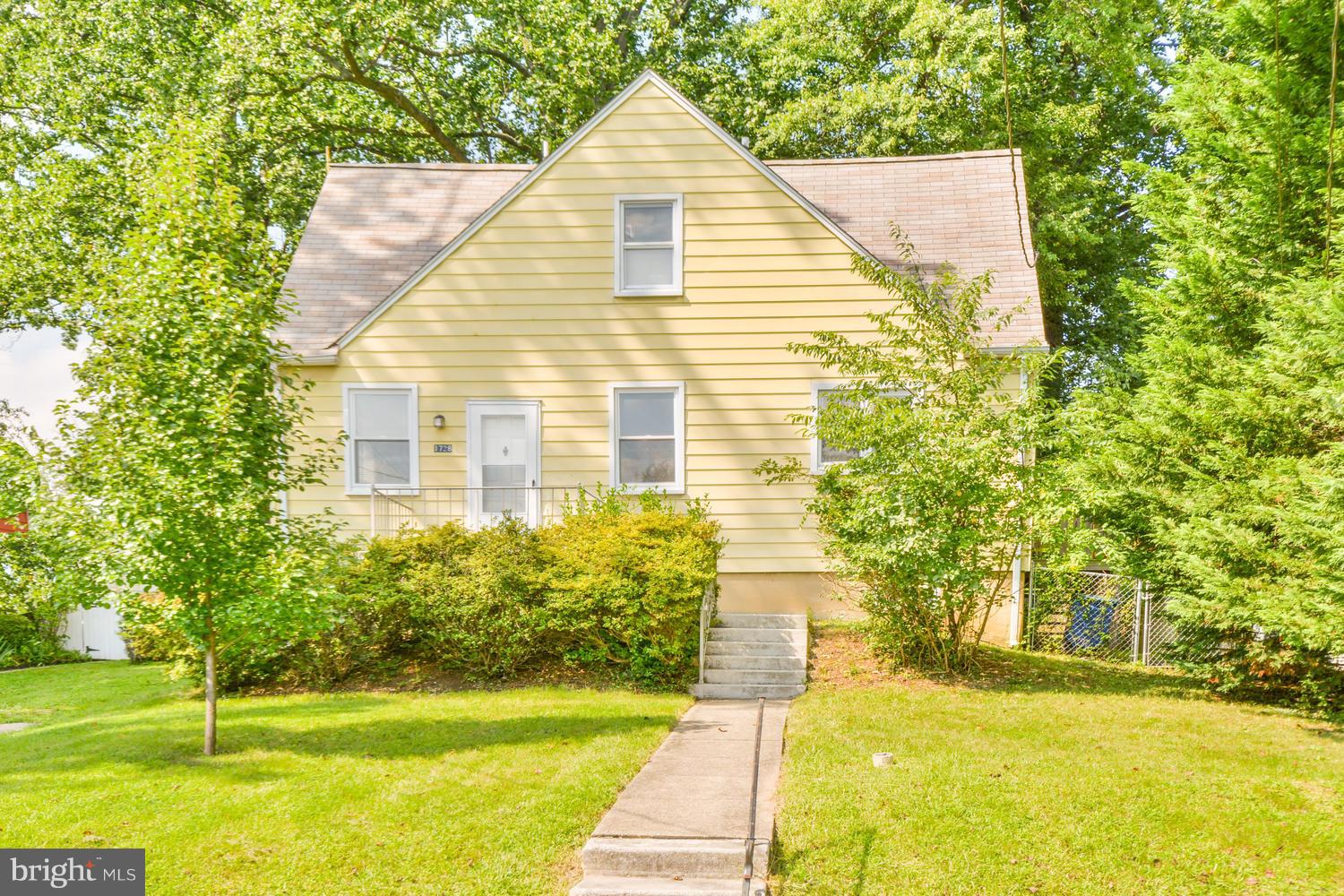 Beautifully Updated with Hardwood Floors, Huge Eat-in Kitchen w/ Tons of Cabinets and Pantry, Spacious Rooms, Ginormous Backyard, Main Level Laundry, Main Level Den/Family Room.  Own This Home For Less Monthly Than Rent!!!