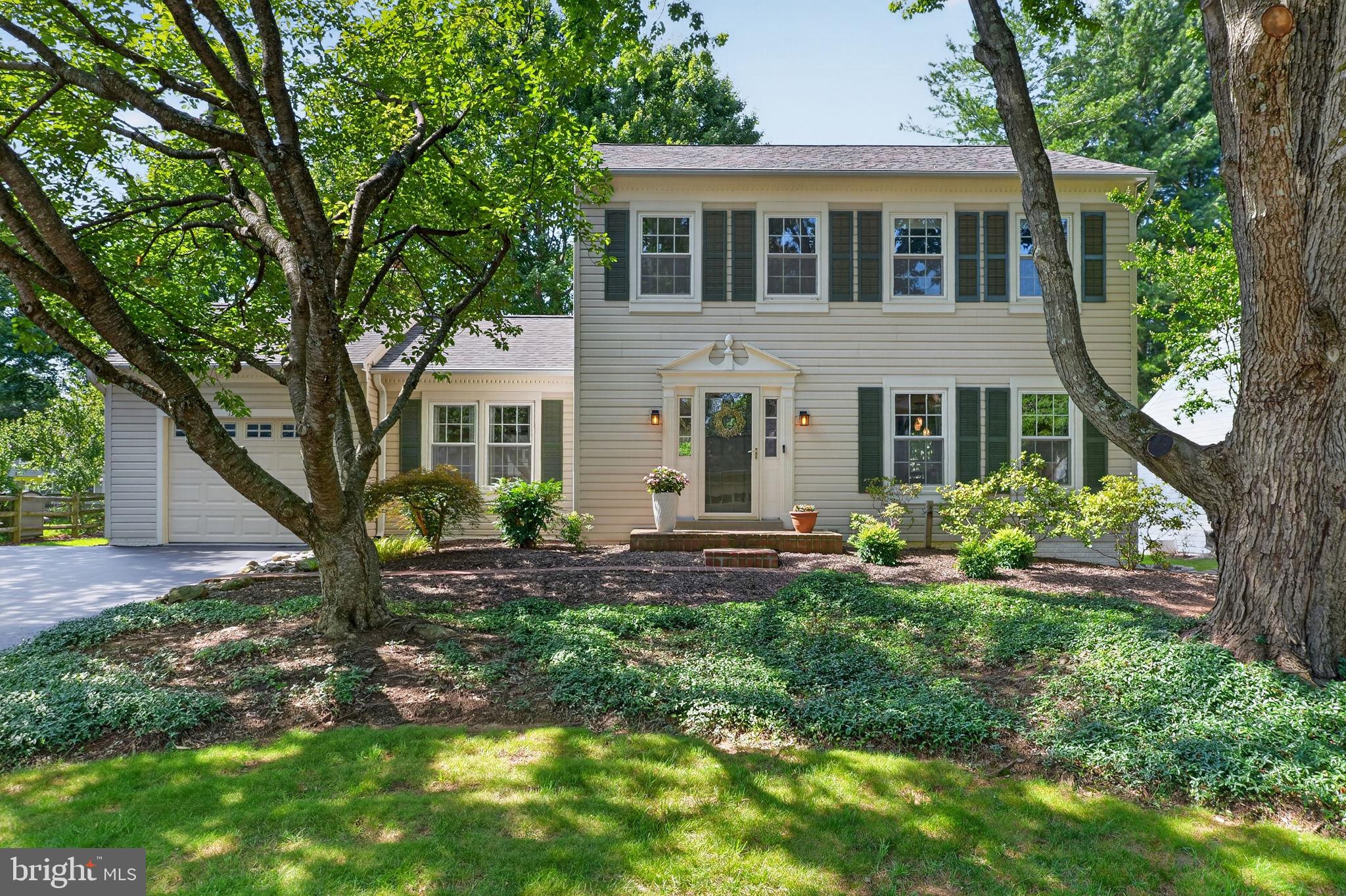 This charming Colonial home in the desirable Churchill Town Sector offers a perfect blend of comfort and style. With its thoughtfully designed living space, this residence features three spacious bedrooms and two and a half baths, ideal for both relaxation and entertaining. The heart of the home is the updated kitchen, complete with upgraded cabinetry, countertops, stainless steel appliances and an eat-in area, seamlessly flowing into the family room, where a cozy wood-burning fireplace awaits for those chilly evenings. Beautiful hardwood flooring enhances the inviting atmosphere throughout. Step outside to enjoy the beautifully landscaped yard and custom patio on a level lot and cul-de-sac street. Perfect for outdoor gatherings or quiet moments. The community amenities are a true highlight, featuring two refreshing outdoor pools, tennis and basketball courts, playgrounds and scenic walking/biking paths that foster an active and vibrant lifestyle. Located within a friendly neighborhood and just doors down from the pool. Residents benefit from nearby Black Hills Regional Park, community center, and well-regarded schools, making it an ideal place to call home. The association handles common area maintenance of all of the amenities and trash services, allowing you to enjoy your surroundings without the hassle. With an attached garage and ample parking, convenience is at your fingertips. A new roof in 2025 protects this home. This is not just a place to live; it's a lifestyle waiting to be embraced. Experience the warmth and community spirit that this lovely property has to offer!
