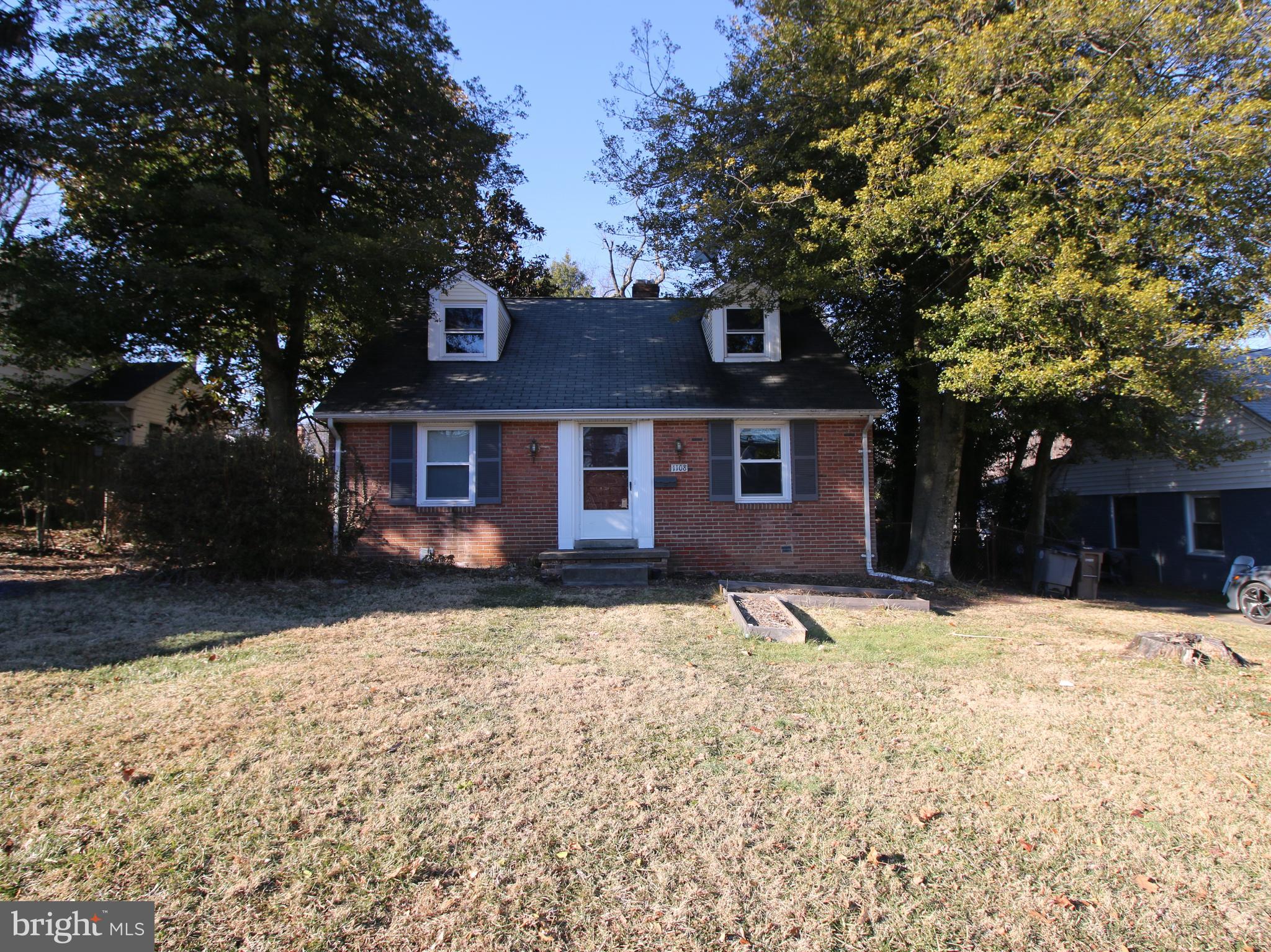 Charming brick single family home in Rockville! This property is in a prime location within walking distance to public transit and just minutes from major commuter routes. Walking distance to shopping, restaruants, and local parks. Property features 2 bedrooms and 1 bathroom and sits on a large .16 acre lot with a fully fenced backyard. The main level features wood flooring throuhout with with a living room featuring a cozy wood burning fireplace. The eat-in kitchen has ample cabinetry and access to your lush backyard. The bedrooms are bright with tons of natural light. The full bath is upgraded with beautiful tilework and flooring. The upper level while unfinished offers ample space for storage and a full size washer and dryer. Don't miss out on this gem!