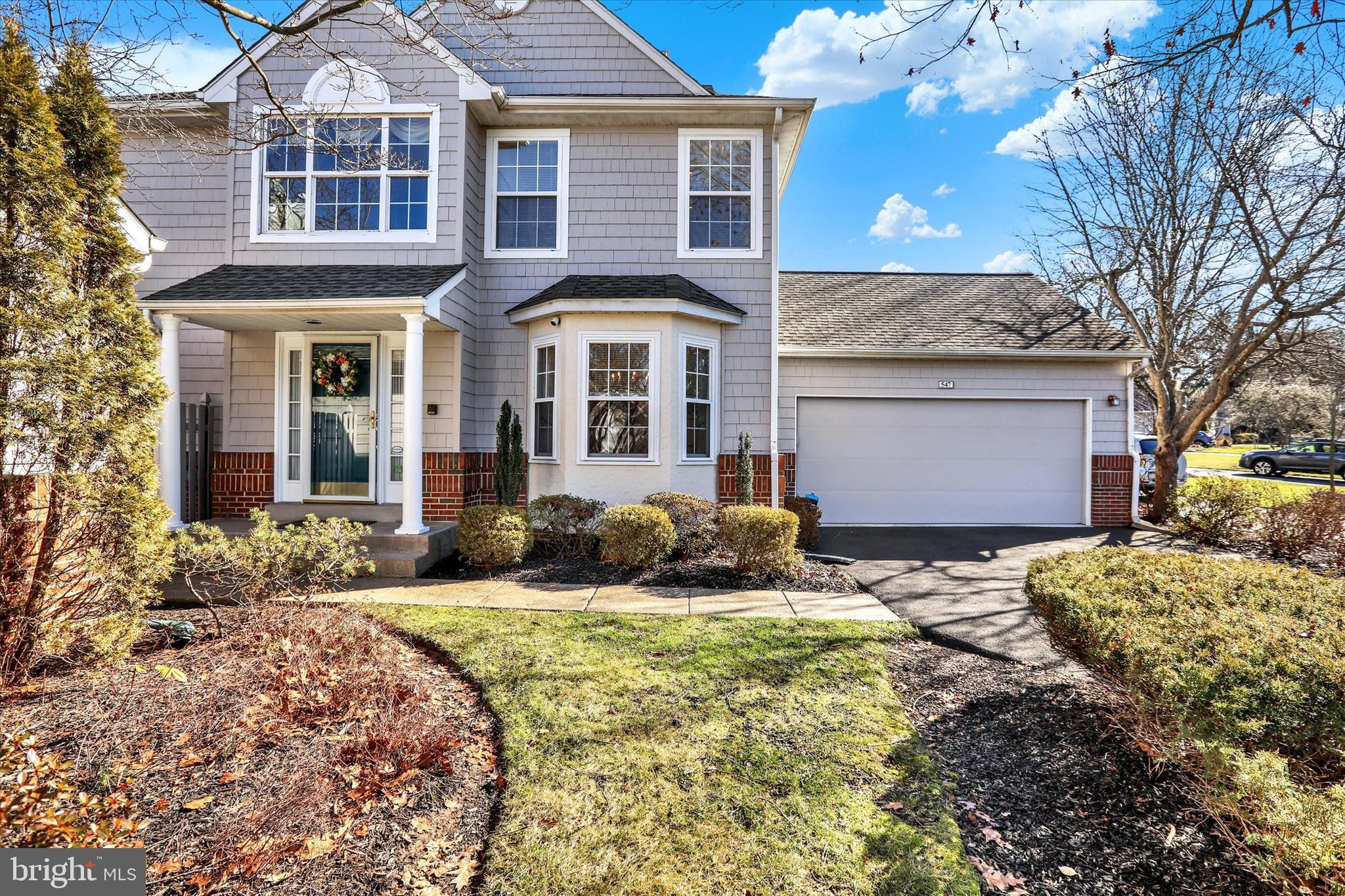 Looking for a single family home with fabulous living space and a carefree lifestyle? Welcome to 547 Palmer Farm Drive in the sought after Palmer Farm neighborhood and Pennsbury School District. This 2,070 sq.ft. turn key Independence model offers 3 large bedrooms, 2.5 baths, a two-car garage and fabulous outdoor space. Begin with a two-story foyer with gleaming hardwood floors that extend throughout both floors of the home.  To the right find a lovely formal dining room featuring two walls of bright, sunny windows and upgraded millwork. To the left, the cozy living room opens to the family room. Curl up with a great book in the sun-drenched family room centered around a cozy fireplace.  A new 3-panel sliding glass door opens to a wood deck where you can entertain friends and family, enjoy peaceful outdoor meals, or simply relax. The family room also opens to the kitchen and breakfast nook with a door to a private paver patio. If you enjoy cooking you will appreciate the kitchen with wood cabinets, granite counters, tile backsplash with under cabinet lighting, stainless gas range, dishwasher, built-in microwave  with external ventilation range hood and stainless refrigerator. A nicely appointed powder room, convenient laundry room and interior garage access complete the first floor. The 2nd floor includes a hallway with large sunny window, spacious primary bedroom replete with a bright, sunlit cornered windows, large cornered walk-in closet and a beautiful ensuite bath featuring dual vanity with white granite counter, white Jacuzzi tub and white tile shower stall with glass door. Two additional bedrooms with generous closet space share a nicely appointed hall bath with single vanity, granite counter and tub/shower stall. Looking for more recreation space? Don't miss the great lower level ready for your future finishes.  In the meantime, it is fantastic clean storage space and exercise area.  Recent updates include a new sliding glass doors (2017/2023), roof (2017), heating system (2019), wood deck (2016), paver patio (2016), hardwood (2015) and hot water heater (2019). The Palmer Farm community offers an in-ground swimming pool, exercise facility, tennis courts, basketball courts, meandering picturesque walking path, and a wonderful tot lot/playground. The location is convenient to terrific restaurants and shopping, Yardley, Newtown, Tyler Park, Core Creek Park and many other quintessential Bucks County experiences. Walk to shopping, dining and brand new Wegman's due to open in March 2024! Easy commuting to Philadelphia, King of Prussia, Hopewell & Princeton, NJ via I-95, Route 1 and the PA Turnpike. Convenient local trains to NYC. The Palmer Farm community is an extraordinary gem - rarely do you find a single family home with basement, two-car garage, outdoor entertaining space and HOA-managed exterior grounds with terrific amenities. Move right in and take the first step to easy living!