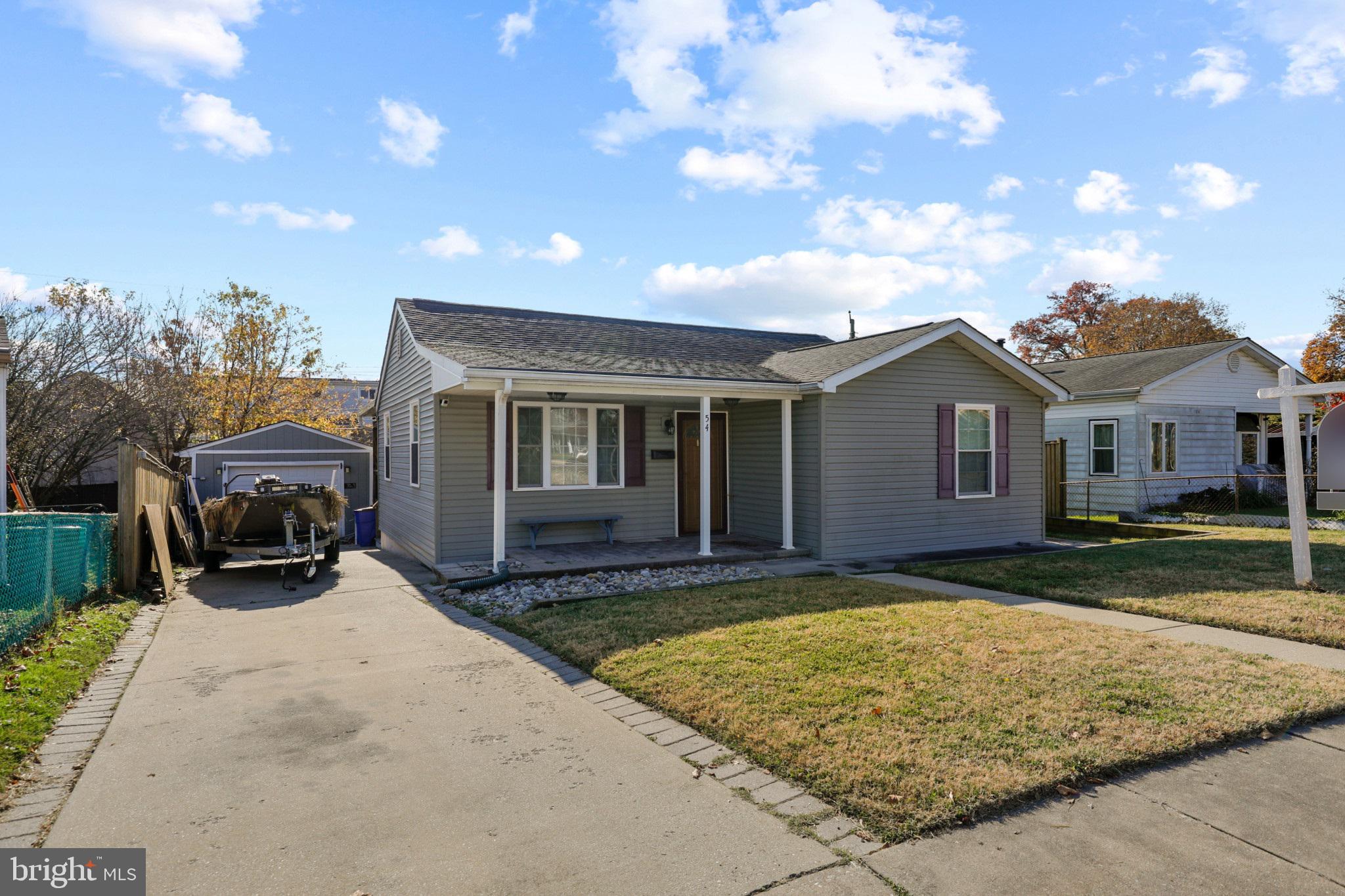This well-maintained and thoughtfully updated rancher home has everything you need to settle in comfortably. As you step inside, you'll be greeted by a generous living room with gleaming hardwood floors, providing a warm and inviting atmosphere. The heart of this home includes an updated kitchen with stainless steel appliances and ample space for dining. All appliances replaced within the last 5 years!  New hot water heater, HVAC Heating/Cooling Fan Motor was replaced in 2022 and fully serviced. The master bedroom comes complete with a fully updated en-suite bath, offering privacy and comfort. The 3rd bedroom has a unique sitting area that could be used as a den or family room, providing flexibility for various lifestyle needs.  Additional storage space is available with the attic pull-down.  Enjoy the outdoors on the rear covered deck, as well as a fenced in yard for privacy and security for you and your pets.  The crawl space was fully encapsulated, and all the gutters have been replaced. The detached garage features 50 -amp electrical service with 3 water-proof outlets to the driveway; perfect for hobbyists, DIY enthusiasts, or extra storage space. Don't miss the opportunity to make 54 Blister St your new home. Schedule a viewing today and envision the wonderful memories you'll create in this delightful property!