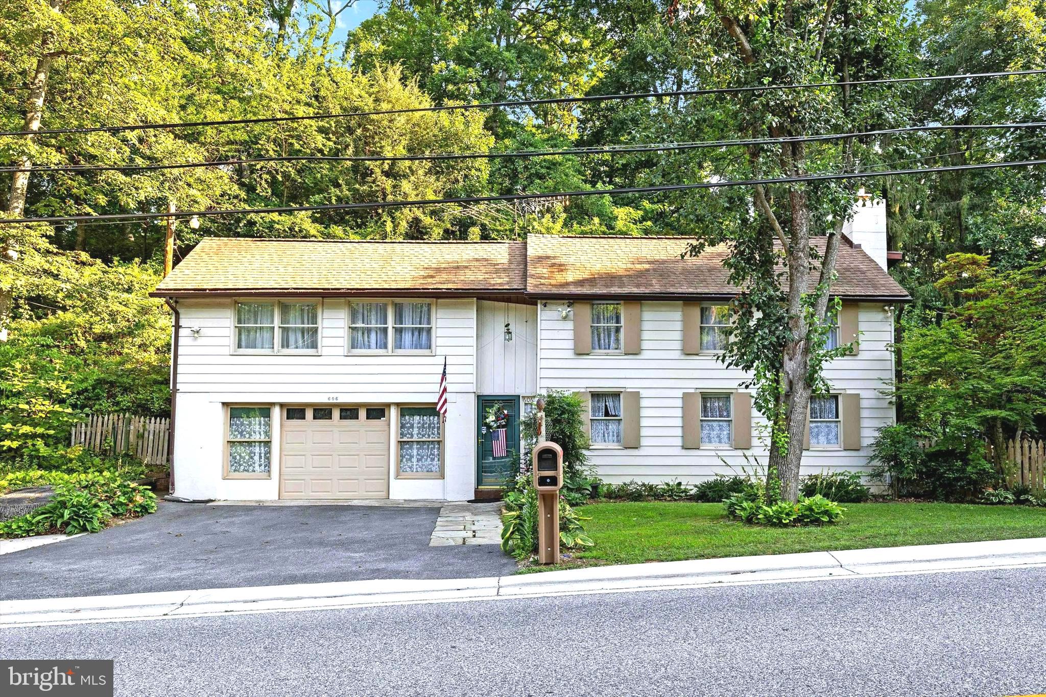 The time is now!  New IMPROVED price point !!  This desirable Maryland /Pa line location makes commuting a breeze. GATED PARKING PAD TO RIGHT SIDE, mature WOODS , a beautiful MULTIPLE variety mature BOXWOOD garden,  small stream and BEAUTIFULLY landscaped areas will not disappoint!  TWO separately deeded properties with just a little over 6 ACRES combined in Baltimore county school district and about 2 miles from I-83 at the MARYLAND/PENNSYLVANIA line!  This beautiful Baltimore county property is zoned RC2 and is a real TREASURE!
To the rear of the property is a large equipment storage shed.  Also convenient to the rail trail at the Freeland entrance.  Any questions concerning building on the separate lot should be directed to Baltimore county.  Seller is motivated !!!