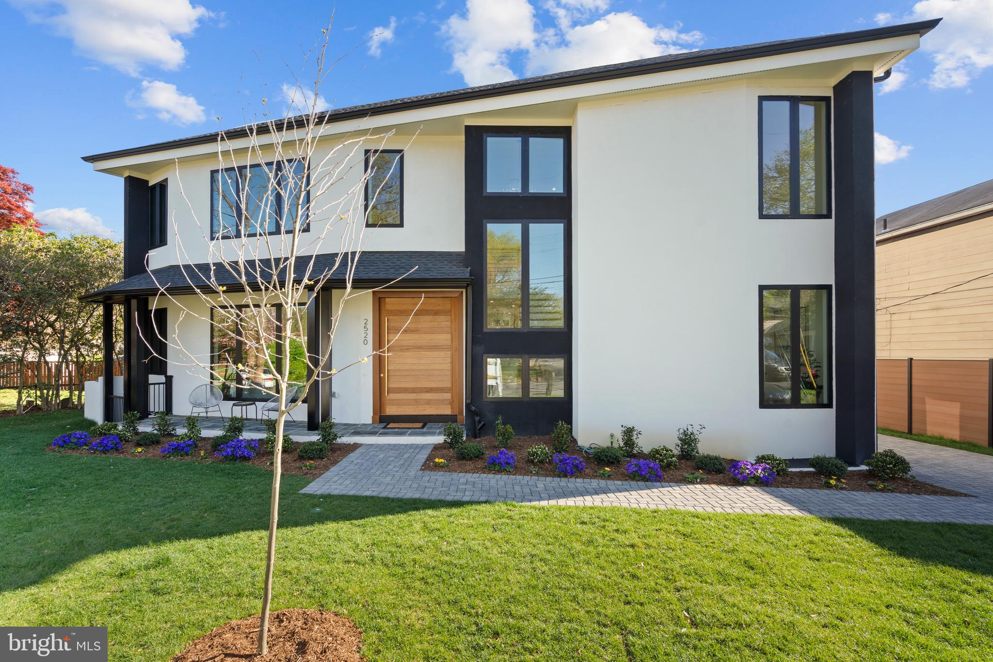 A stunning new custom residence by Shamron Builders brings modern architecture, luxurious finishes, and exceptional craftsmanship to the heart of the charming Penrose Historic District.

Set on a beautifully landscaped lot, this home blends bold contemporary design with warm, inviting interiors and curated designer finishes. The sophisticated exterior features a black shingle roof, crisp white façade, natural wood accents, and expansive light-filled windows. A 9-foot hardwood pivot door opens to an elegant open-concept layout ideal for everyday living and entertaining.  Inside, hardwood floors, designer lighting, and two fireplaces create a refined yet welcoming atmosphere. The gourmet kitchen anchors the home with Thermador appliances, custom cabinetry, and a statement island that flows seamlessly into the main living and dining areas. Additional highlights include Andersen 200 Series windows, abundant recessed lighting throughout, a functional mudroom.  No HOA.

Upstairs, the primary suite offers a private retreat with walk-in closets and a spa-inspired baths finished in Italian porcelain tiles. All bedrooms feature generous closets. 

Enjoy seamless indoor-outdoor living with a landscaped yard and proximity to Penrose Park. A detached garage with workspace and attic storage, along with a long driveway, accommodates up to four vehicles. Ideally located near Clarendon, Columbia Pike, and Washington, DC, with easy access to dining, shopping, and commuter routes.

A rare opportunity to own a beautifully crafted modern home in one of Arlington's most welcoming and established communities. Adding to its appeal, this brand new  home  now includes a brand-new 13kW automatic standby generator — ensuring whole-home comfort and uninterrupted daily living during any power outage.