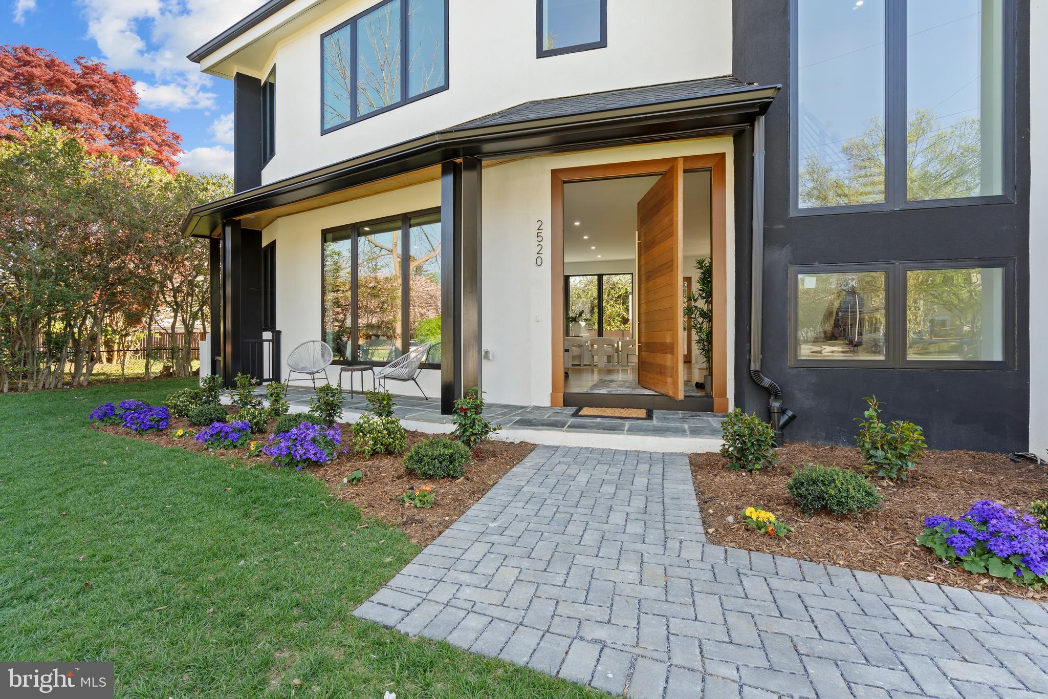 📢 NEW ADJUSTED PRICE! 2520 5th St S, Arlington is now available at $2,099,000. Don't miss this opportunity — schedule a showing today! A stunning new custom residence by Shamron Builders brings modern architecture, luxurious finishes, and exceptional craftsmanship to the heart of the charming Penrose Historic District.

Set on a beautifully landscaped lot, this home blends bold contemporary design with warm, inviting interiors and curated designer finishes. The sophisticated exterior features a black shingle roof, crisp white façade, natural wood accents, and expansive light-filled windows. A 9-foot hardwood pivot door opens to an elegant open-concept layout ideal for everyday living and entertaining.  Inside, hardwood floors, designer lighting, and two fireplaces create a refined yet welcoming atmosphere. The gourmet kitchen anchors the home with Thermador appliances, custom cabinetry, and a statement island that flows seamlessly into the main living and dining areas. Additional highlights include Andersen 200 Series windows, abundant recessed lighting throughout, a functional mudroom.  No HOA.

Upstairs, the primary suite offers a private retreat with walk-in closets and a spa-inspired baths finished in Italian porcelain tiles. All bedrooms feature generous closets. 

Enjoy seamless indoor-outdoor living with a landscaped yard and proximity to Penrose Park. A detached garage with workspace and attic storage, along with a long driveway, accommodates up to four vehicles. Ideally located near Clarendon, Columbia Pike, and Washington, DC, with easy access to dining, shopping, and commuter routes.

A rare opportunity to own a beautifully crafted modern home in one of Arlington's most welcoming and established communities. Adding to its appeal, this brand new  home  now includes a brand-new 13kW automatic standby generator — ensuring whole-home comfort and uninterrupted daily living during any power outage.