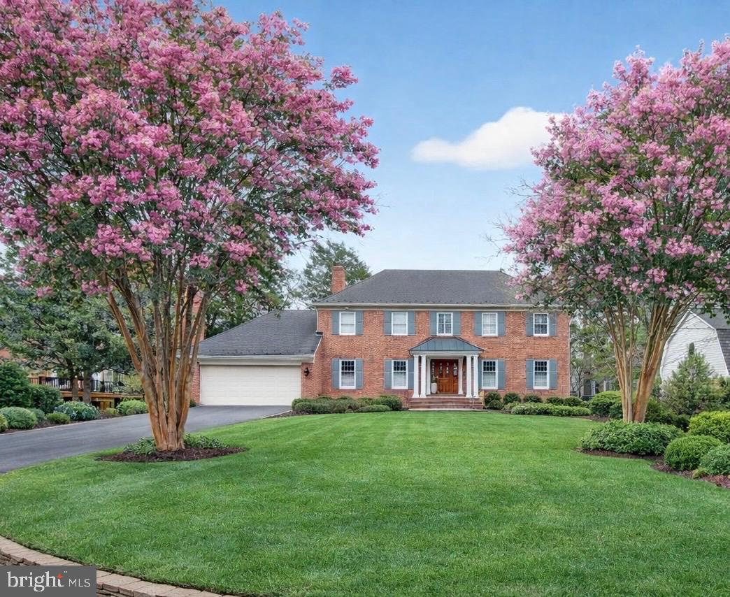 OPEN HOUSE SAT 4/11 11am-1pm
Sun 4/12 2-4pm

Stately Brick Colonial with Resort-Style Backyard in the Heart of McLean

Nestled on a beautifully landscaped lot in the sought-after Lynwood neighborhood, this timeless brick colonial offers the perfect blend of classic elegance and modern luxury. With 5 bedrooms, 5 full bathrooms, and approximately 4,400 square feet of living space, this home is designed for both everyday comfort and exceptional entertaining.

A gracious front elevation framed by mature crape myrtles and manicured greenery welcomes you into a thoughtfully curated interior. The main level features rich hardwood flooring, plantation shutters, and refined moldings throughout. The stunning BOWA-designed kitchen is a true centerpiece—complete with a marble island, granite countertops, custom cabinetry, and top-of-the-line appliances including Viking, Wolf, SubZero, Miele, and Dacor . Multiple living spaces, including a family room and formal living room each with gas fireplaces, create a warm yet sophisticated atmosphere.

Upstairs, the serene primary suite offers a private retreat with its own fireplace, dual walk-in closets, and a spa-inspired bath. Three additional bedrooms and updated bathrooms provide ample space for family and guests.

The fully finished walk-out lower level is designed for entertaining and versatility, featuring a spacious recreation room with built-ins and fireplace, a wet bar, gym, fifth bedroom, and full bath—ideal for guests or an au pair suite.

Step outside to your own private oasis. The expansive backyard showcases a heated pool with spa, extensive hardscaping, and a large Trex deck overlooking the lush grounds—perfect for summer gatherings or quiet relaxation.

Additional highlights include a whole-house generator, tankless water heater, Sonos sound system, security system, and a freshly updated two-car garage.

Ideally located just minutes from major commuter routes, Tysons Corner, downtown McLean, and Washington.

A rare opportunity to own a truly turnkey home in one of McLean’s most desirable neighborhoods.