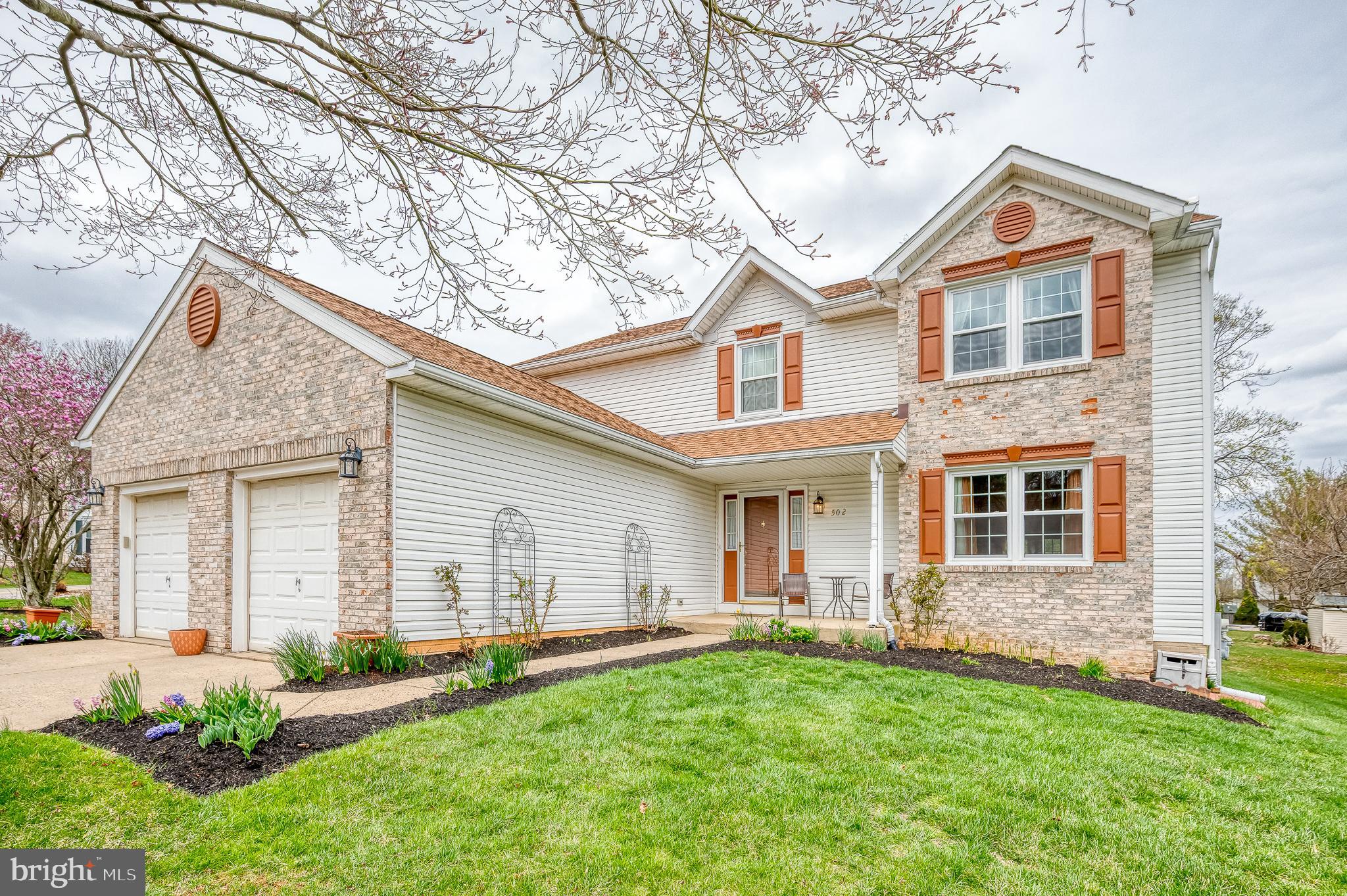 Welcome to 502 Summervale Court, a former model home, situated in a quiet cul-de-sac. Just inside the covered front porch, you'll find a two-story foyer with hardwood floors that flow into the living room. It opens to the sunken family room with pocket doors, where you'll find a brick surround gas fireplace and exit to the rear of the home. The eat-in kitchen has luxury vinyl plank flooring along with new stainless steel appliances (2021/2022) and backsplash. The main level laundry is just steps away with washer/dryer (2021) and you'll find a dining room with crown and chair molding. Upstairs, there is new carpet and fresh paint in the primary bedroom - complete with walk-in closet, vaulted ceiling and attached primary bathroom with double sink and jacuzzi tub. There are three additional bedrooms sharing a hall bathroom. The lower level is also finished with a large rec room and tons of storage. This home has tons of recent updates, including new windows (2023); new roof (2021); water heater (2022); appliances (2022/2021); and HVAC 2016. There is a modest HOA and a great rear yard with patio on the side of the home. You'll find peach trees and moscato grapes in the yard. This home is sure to impress!