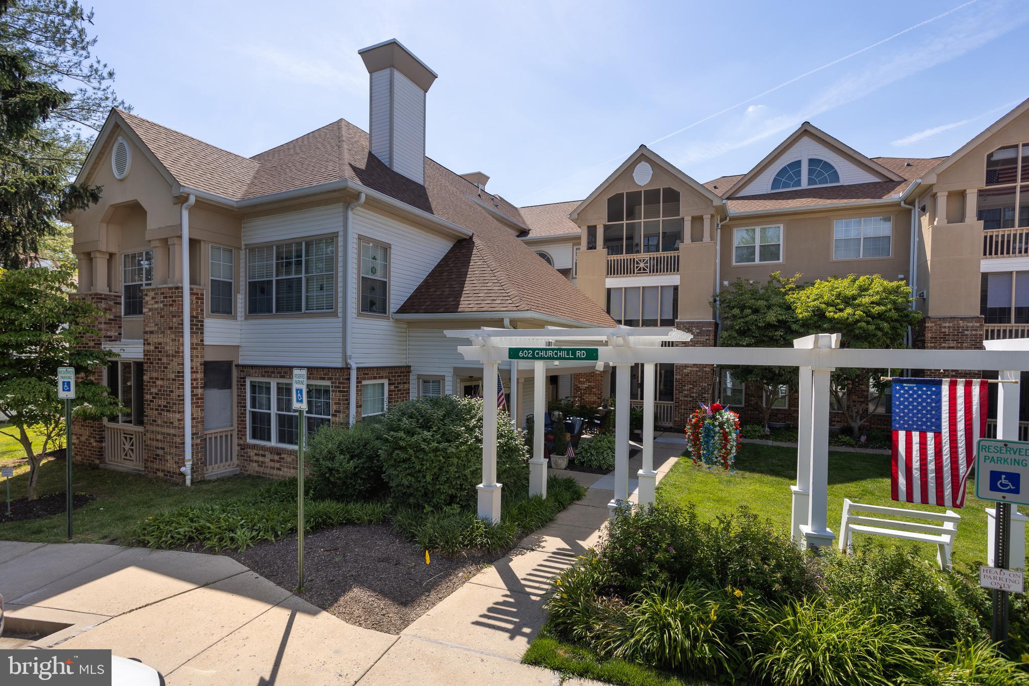 Beautiful 2 Bedroom/2 Full Bath Penthouse Condo w/stunning private balcony views. Located in the charming estates of  English Country Manor offers a perfect blend of comfort and style. The open concept layout  features main level living. Gourmet kitchen w/breakfast bar, upgraded cabinets and granite countertops that complement the stainless steel appliances. Separate dining room w/hardwood floors and elegant moldings. Vaulted ceiling highlights the family room leading to a beautiful sunroom/den  w/balcony access. Retreat to the primary bedroom w/private bath featuring a jetted tub and a generous walk-in closet that provides ample storage. French doors opening to a balcony from the primary bedroom allow you to embrace the tranquility of lovely views. Enjoy the community resort style living offering a clubhouse with outdoor pool, fitness center and meeting rooms and more. Picnic area and park benches with fountain views are  perfect for socializing or relaxing. Parking  is hassle-free with off-street options available.  Monthly condo fee covers water, sewer, trash, and exterior maintenance.Close to interstate travel, shopping, restaurants and access to the  MA & PA trail .