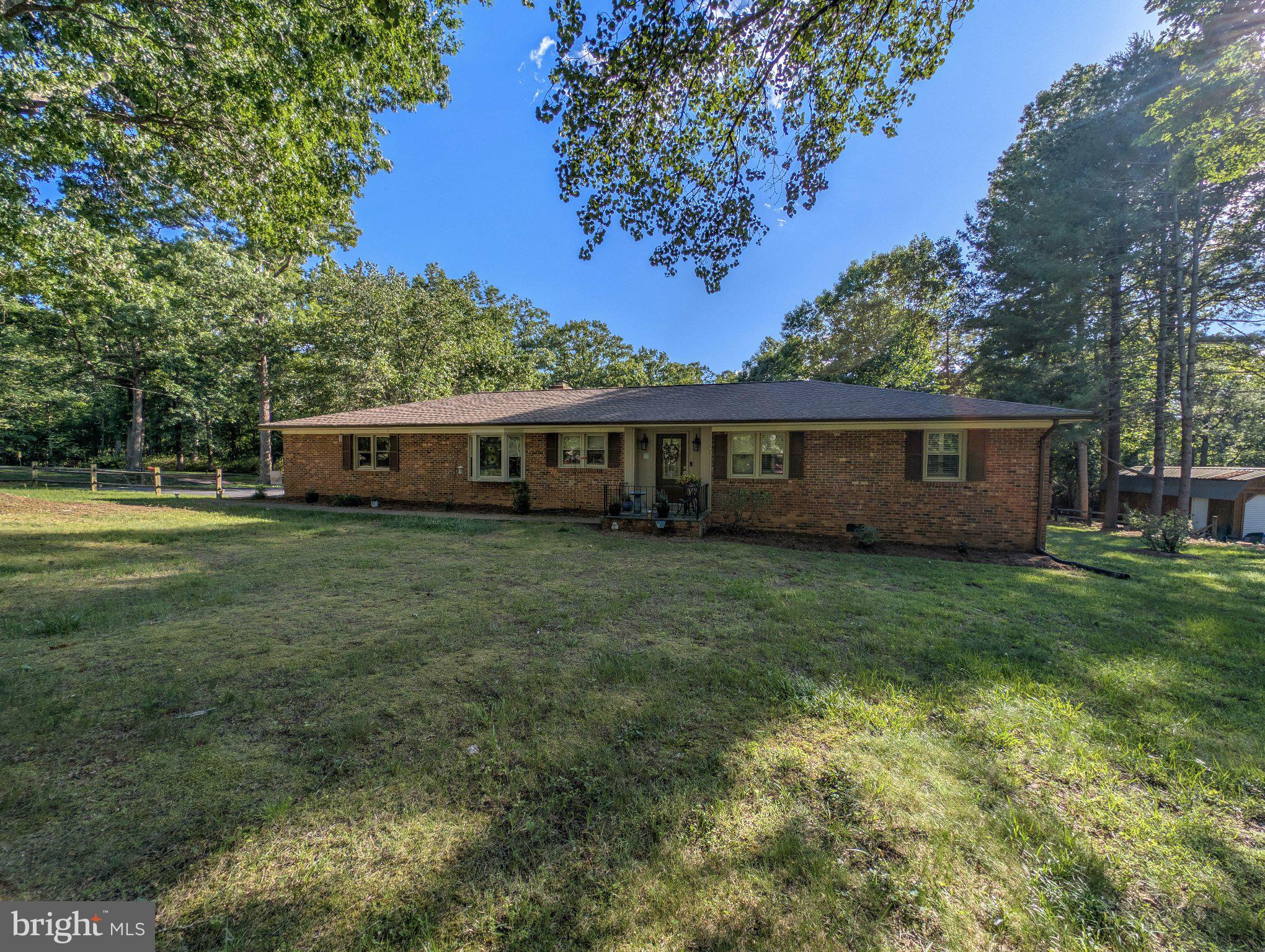 Well-maintained brick rambler situated on just over an acre in Culpeper County. This 3-bedroom, 2-bath home features a spacious living area with an open feel, hardwood floors, and an updated kitchen. The enclosed sun porch provides additional living space and connects to the rear deck, making it easy to enjoy the outdoors. An attached garage offers added convenience and storage. Major updates include a roof that is only 2 years old and an HVAC system that is 3 years old.

Conveniently located near Route 29 and just minutes from Mountain Run Lake Park, which offers pickleball courts, playgrounds, a dog park, athletic fields, shelters, and a boat launch. This property combines a peaceful setting with easy access to recreation, shopping, dining, and everyday conveniences.