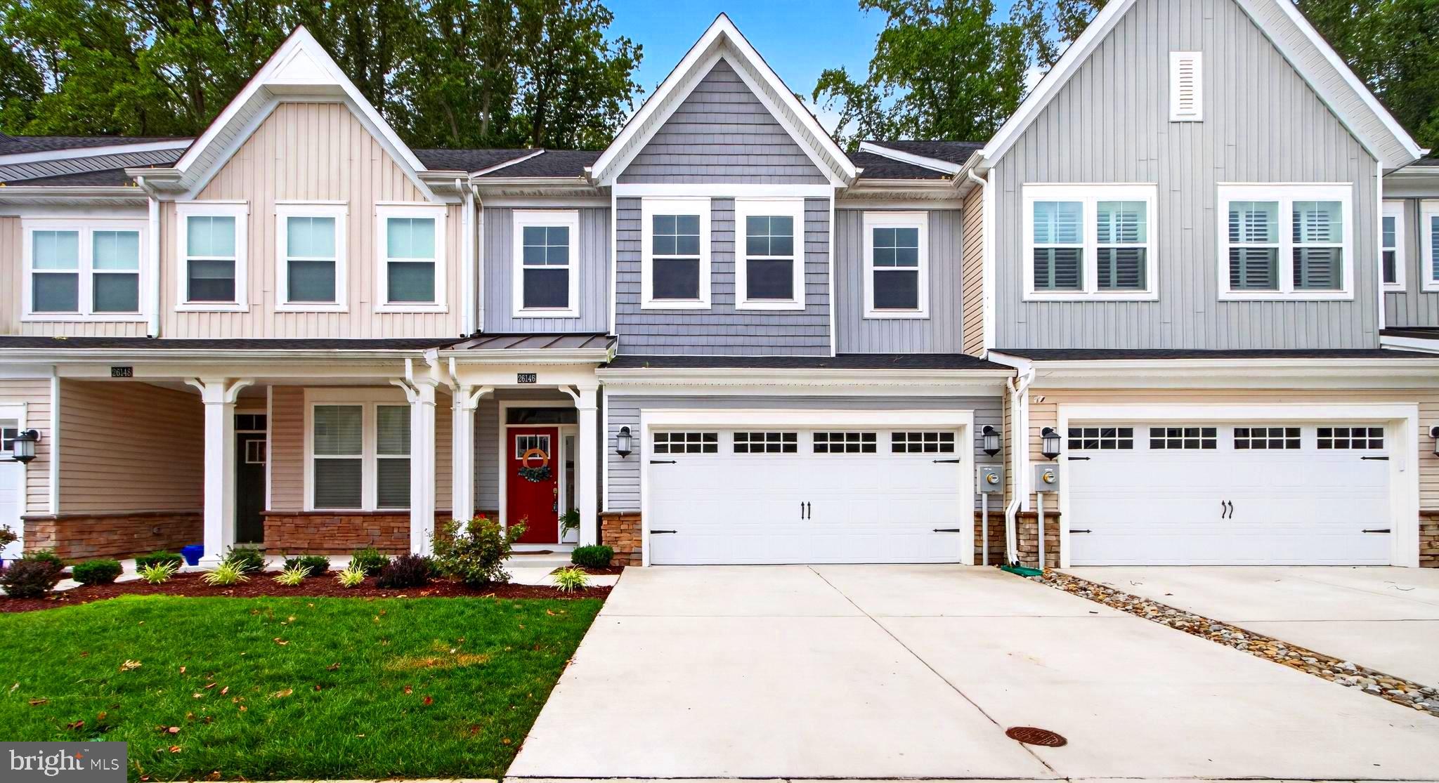 Experience elevated coastal living in the amenity-rich community of The Villas at Walden, where modern design, resort-style amenities, and an exceptional location come together just minutes from Lewes and Rehoboth Beach. Built in 2022 and impeccably maintained, this beautifully appointed 3-bedroom, 2.5-bath townhome offers the perfect opportunity to enjoy Delaware’s coveted beach lifestyle with the comfort and convenience of low-maintenance living.
From the moment you step inside, you’ll appreciate the thoughtfully designed open-concept floor plan, elegant finishes, and an abundance of natural light throughout the home. Beautiful transom windows enhance the inviting atmosphere, allowing sunlight to fill the living spaces while creating a bright and airy coastal feel. Luxury vinyl plank flooring flows seamlessly throughout the main living areas, adding both style and durability.
The beautifully upgraded kitchen serves as the heart of the home, featuring sophisticated quartz countertops, stainless steel appliances, a spacious center island, and a seamless connection to the dining area and great room—creating the perfect setting for entertaining guests or enjoying relaxed evenings at home.
A spacious first-floor primary bedroom provides a peaceful retreat with a large walk-in closet and a spa-inspired en-suite bath featuring dual vanities and a walk-in shower with dual shower heads. Upstairs, two additional bedrooms share a bathroom with a tub/shower combo.
Step outside and enjoy the privacy of a wooded backdrop from your concrete patio, an ideal space for outdoor dining, grilling, or simply unwinding after a day at the beach. The attached garage and driveway provide convenient parking and additional storage for all of your coastal lifestyle essentials.
The Villas at Walden offers an exceptional resort-style living experience with an impressive collection of amenities, including a beautiful clubhouse, two outdoor swimming pools, tennis courts, pickleball courts, scenic walking and jogging trails, and water access along Burton’s Prong of Rehoboth Bay for kayaking and paddleboarding. With beautifully maintained grounds and a welcoming community atmosphere, residents can enjoy a vacation-inspired lifestyle every day.
Ideally located approximately eight miles from both downtown Lewes and Rehoboth Beach, this home provides easy access to award-winning restaurants, boutique shopping, beaches, marinas, golf courses, and all the attractions that make coastal Delaware one of the most desirable destinations on the East Coast.
Whether you’re searching for a year-round residence, a beach retreat, or an investment opportunity, this exceptional townhome delivers the perfect blend of luxury, location, and lifestyle. Discover the best of coastal living at The Villas at Walden.
