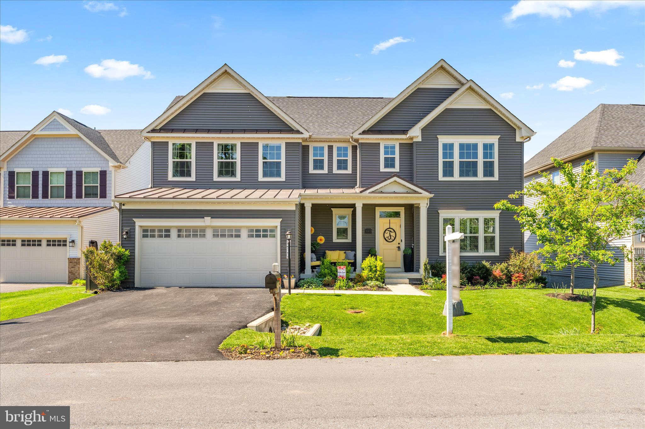 Welcome home to Cardozo Street… considered by many to be one of the best streets in the community, and once you arrive, it is easy to see why. Tucked into the sought after Woodridge section of Lake Linganore, this beautifully maintained 4 bedroom, 4 full bath and 1 half bath home offers the perfect blend of space, functionality, and lifestyle. Positioned across from open space and a park, the setting alone sets this one apart. Inside, the main level is thoughtfully designed with a dedicated office, spacious living area, and a dining space that flows seamlessly for both everyday living and entertaining. The kitchen is both functional and inviting, featuring white cabinetry, quartz countertops, coordinating backsplashes, a custom pantry, and upgraded light fixtures that elevate the space with a clean, modern feel. Upstairs, you will find all four bedrooms along with a conveniently located laundry room. The primary suite features a statement wall, an ensuite bath with dual vanities, a shower, a private water closet, and a large walk in closet. One of the secondary bedrooms also includes its own ensuite bath and walk in closet, creating an ideal setup for guests or multi generational living. The finished basement with LVP flooring adds incredible versatility, complete with a full bathroom and walkout access to the patio and yard, perfect for additional living space, guests, or a private retreat. Not to mention a custom indoor playhouse, the littles are sure to love. Step outside and you will find one of the true highlights of this home. A fully fenced yard, covered and enclosed porch, and an expansive patio create a private outdoor oasis that is ready for slow mornings, raising a family, hosting friends, or unwinding at the end of the day. Solar panels and an electric car outlet add efficiency and forward thinking convenience. Located just steps from trails, parks, basketball courts, and everything Lake Linganore has to offer, this home delivers not just a place to live, but a lifestyle to love.