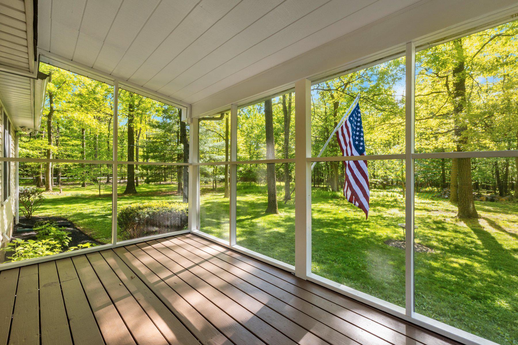 Welcome to 10820 Gambrill Park Road, where privacy, nature, and peace of mind come together on 5.3 beautiful wooded acres just minutes from Frederick.

This move-in-ready ranch home offers comfortable one-level living with 3 bedrooms, 2 full baths, hardwood floors, and flexible finished space in the lower level. Surrounded by mature trees and a tranquil natural setting, the property provides the privacy and outdoor space that are increasingly difficult to find.

The current owners have invested extensively in the home, including a brand-new CertainTeed architectural roof, refinished hardwood flooring, fresh interior and exterior paint, updated porch and patio areas, landscaping improvements, a high-efficiency LPG furnace with privately owned 1,000-gallon propane tank, and numerous additional system and appliance upgrades.

Inside, inviting living spaces are enhanced by both a wood stove and pellet stove, creating warmth and character throughout the seasons. The lower level offers abundant storage, workshop space, recreation space, or future expansion potential.

Outdoor living is equally appealing, with a welcoming front porch, screened patio, and plenty of room to enjoy the natural surroundings. Significant tree removal and land stewardship efforts have improved the health and usability of the property while preserving its wooded charm and privacy.

Pet owners will appreciate the powered pet door and approximately one acre of underground invisible fencing already installed.

Whether you're looking for a peaceful full-time residence, a private retreat, or simply more room to enjoy the outdoors, this well-maintained property offers exceptional value, recent updates, and a setting that feels worlds away while remaining conveniently close to Frederick's amenities, parks, and commuter routes.
