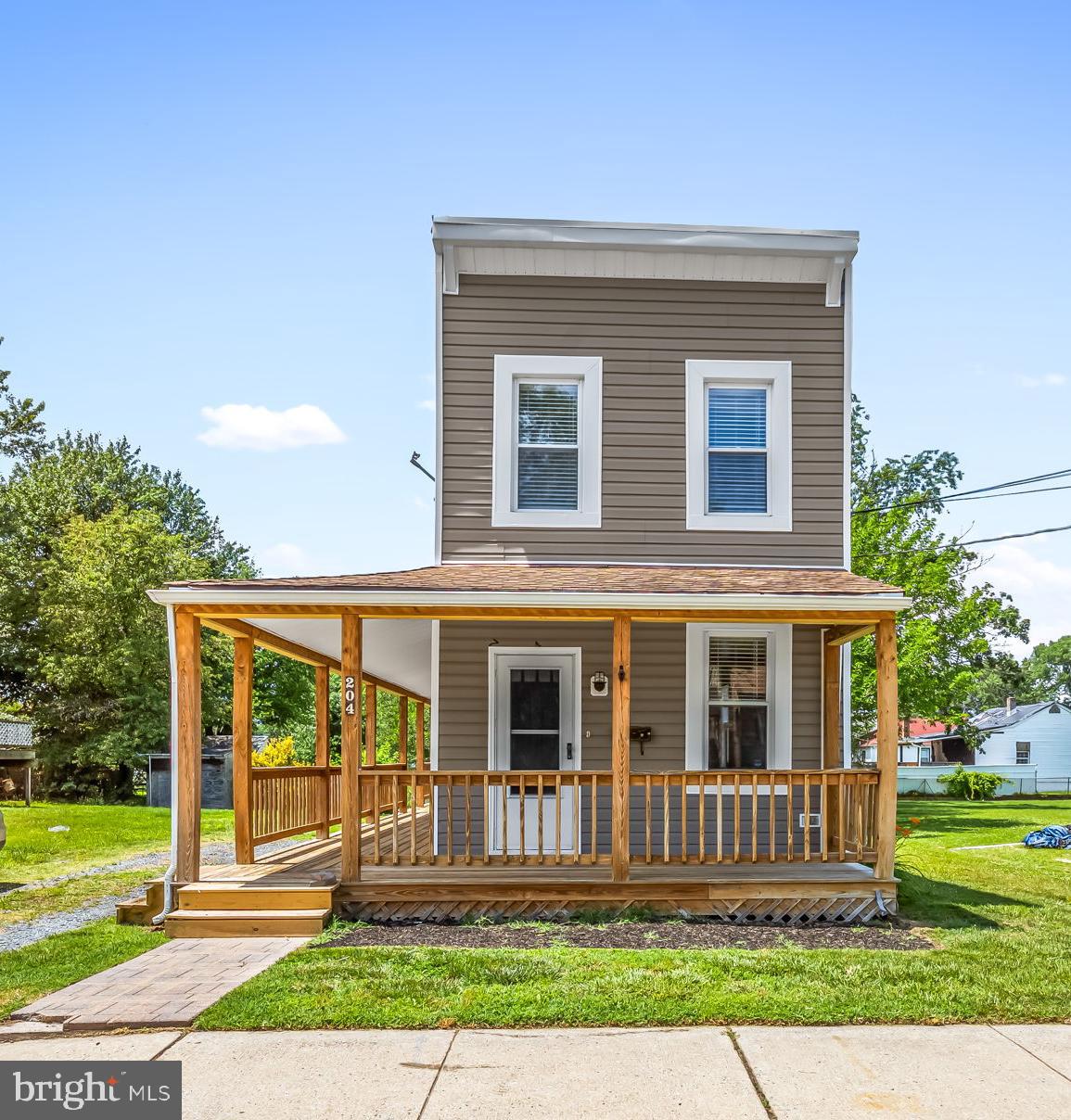 Welcome to 204 Mace Avenue, a beautifully renovated 3-bedroom, 2-bath home in Essex. Thoughtfully updated from top to bottom, this move-in-ready property offers modern finishes and comfortable living spaces with an efficient layout making excellent use of every square foot.   The stylish kitchen features new gray cabinets with beautiful quartz counters and new stainless steel appliances.   The main level offers a large living/dining area combo as well as a full bath with shower.  The upper level features well sized bedrooms and another full bathroom.   The exterior features a wrap around front porch as well as a rear deck in the fenced yard, complete with a fire pit.  This home offers easy access to everyday essentials and local conveniences with shopping and a variety of dining options, local eateries, coffee shops, and retail services can be found along Eastern Boulevard.