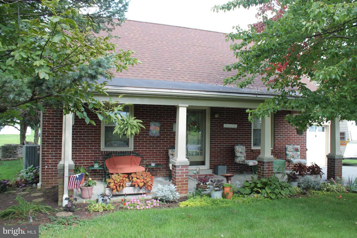Charming all brick hone in a convenient location. Close to 283, 30 & Park City! Good starter home in great condition. Original hardwood floors. Charming, classic kitchen in outstanding condition. 3 year old roof. Recent driveway replacement (7 yrs old). 2 year old water heater. New electric service in 2008. Ductwork cleaned 2 yrs ago. Professionally waterproofed basement (Mid Atlantic) guaranteed! with battery backup! New Well pump in 2005. Large, wide front porch. Oversized deck with built-in benches. Shed in excellent condition (new roof & door). 1 car oversized garage. Septic pumped 2 years ago. 26 new windows. New bath w/antique clawfoot tub. Large attic storage area.