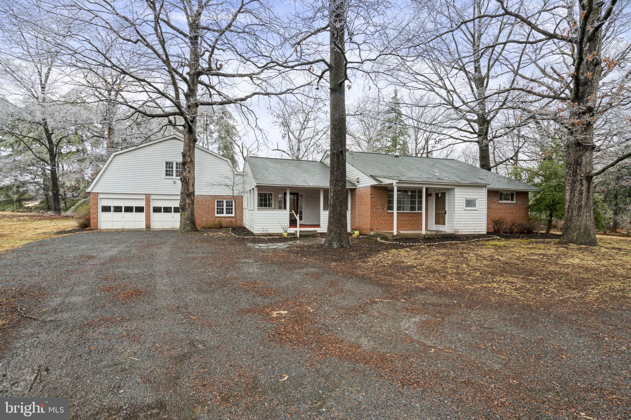 Large home with Fresh Paint and New Flooring sitting on over 3 acres! Plus two car attached garage! Original home has an enormous addition making this a great family home for entertaining!  Two bedrooms and third could be a bedroom or an office! Close to great commuter routes! Plus restaurants, shopping, medical needs and more! Available now!