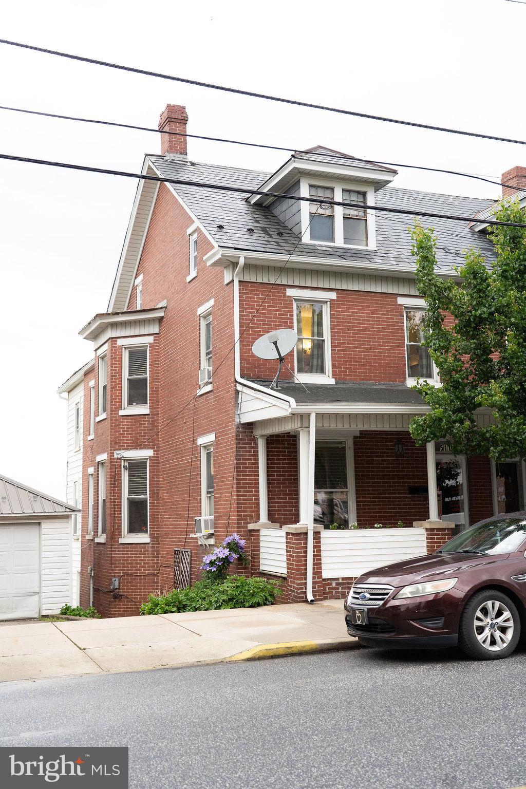 Looking for Space, Character, and a Prime Location in Red Lion Borough?  This Charming 1900s Brick Semi-Detached Home offers nearly 2,000 square feet of Finished Living Space and Classic Architectural details. Step inside to discover a Massive 15x28 Living and Dining Room combination, highlighted by gorgeous Nuetral Color Flooring and a Striking Marble decorative Fireplace—perfect for gatherings. The main floor offers a Completed Renovated Kitchen featuring White Shaker Cabinets and Quartz Countertops. Upstairs, you will find 3 Spacious bedrooms and a Full Bathroom. Storage is a breeze with an Expansive Basement and a Full Walk-Up Attic. Conveniently located within walking distance to Red Lion Area Junior and Senior High Schools, local parks,  shopping and the one and only Franklin Street Social. Schedule your private tour today to experience this perfect blend of historic charm and modern updates!