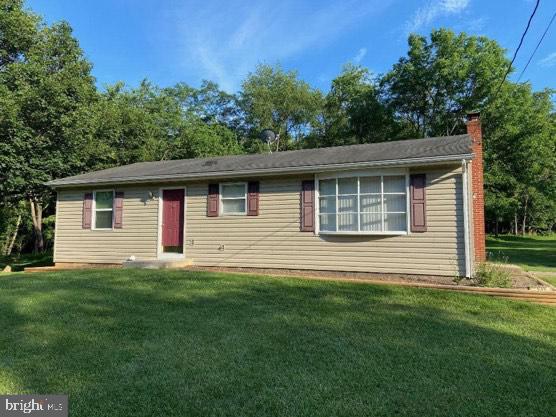 Secluded rancher located on outskirts of city limits on .88 acres, no HOA's and completely unrestricted.  Main level includes 2 large bedrooms  with a double closet in the master bedroom.  Home features a  fully finished basement with a kitchen, full bath, 1 extra room (can be considered a bedroom) and a family room.  Beautiful front yard for the growing family! Schedule an appointment today before you miss out on this one! Seller to give 3k towards closing cost, flooring etc with an acceptable offer. Pending release .