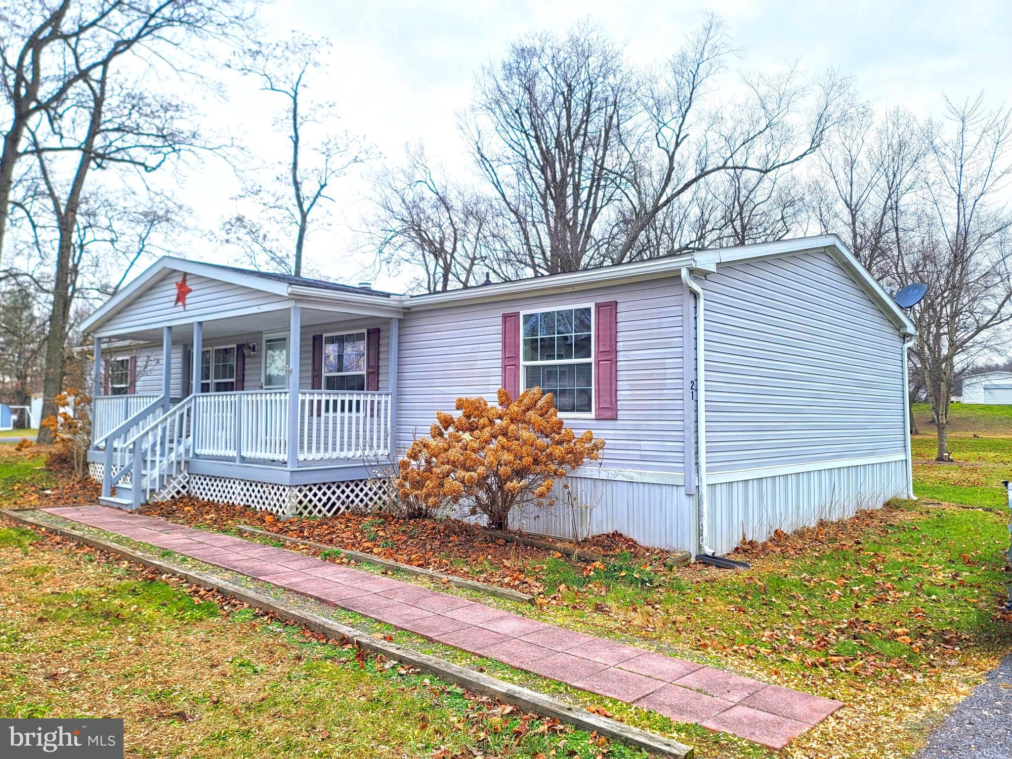 Move-in ready, spacious, 3 bedroom 2 bath, Redman Mobile home built in 2008. This home is in a tree-lined park-like setting in Halifax Village Mobile Home Park. Entering the home from the large front porch you are greeted by the cozy warm glow of the gas fireplace. The dining room and kitchen are all within sight of each other. This open concept will have all your company feeling included no matter what room they are in.  The main bedroom off the living room has a huge walk-in closet attached to the well-appointed on-suite bath with a shower and a separate soaking tub. The two other bedrooms both have walk-in closets and are a very generous size.  The laundry room off the kitchen also has an area for folding and laundry storage as well as a second entrance located at the back of the home.