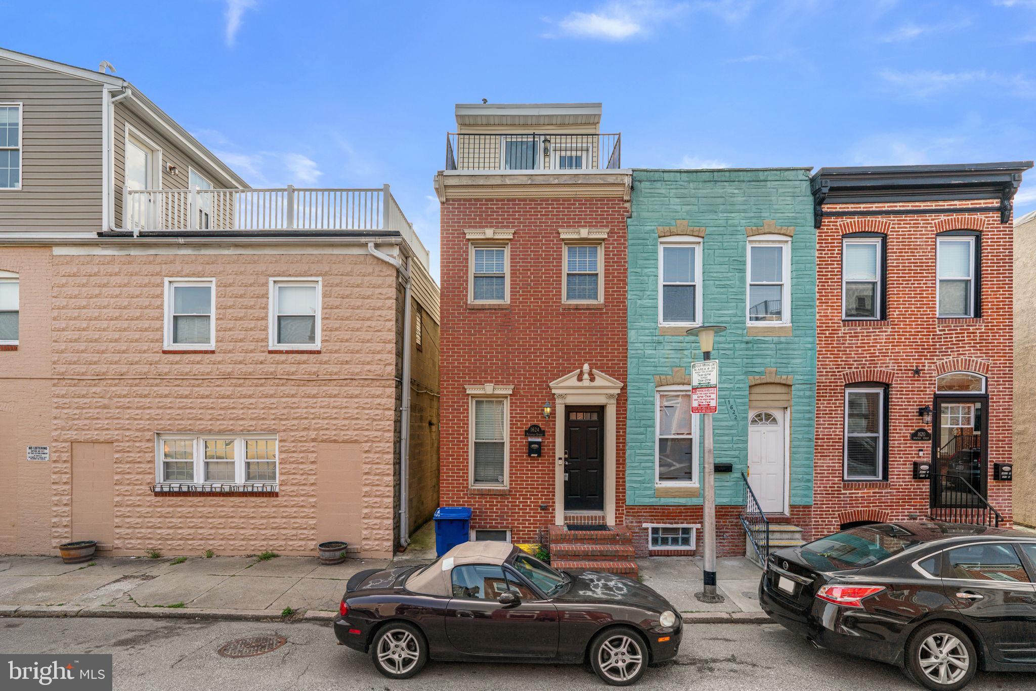 Move right into this exceptional end-of-row townhome in the highly sought-after Federal Hill neighborhood! This 3-bedroom, 2.5-bath home welcomes you with a bright, inviting living room that flows seamlessly into a fully renovated kitchen featuring ample cabinetry, generous counter space, stainless steel appliances, and stylish open shelving.

Upstairs, the second level offers two spacious bedrooms, a full bath, and convenient laundry. Retreat to the top floor, where the private primary suite boasts a large en-suite bathroom and its own balcony with stunning views of Baltimore’s skyline.

The lower level provides additional living space—perfect for relaxing or entertaining—along with a half bath. Enjoy outdoor living on the rear deck overlooking a fenced patio. Ideally located with easy access to shopping, dining, and major commuter routes.