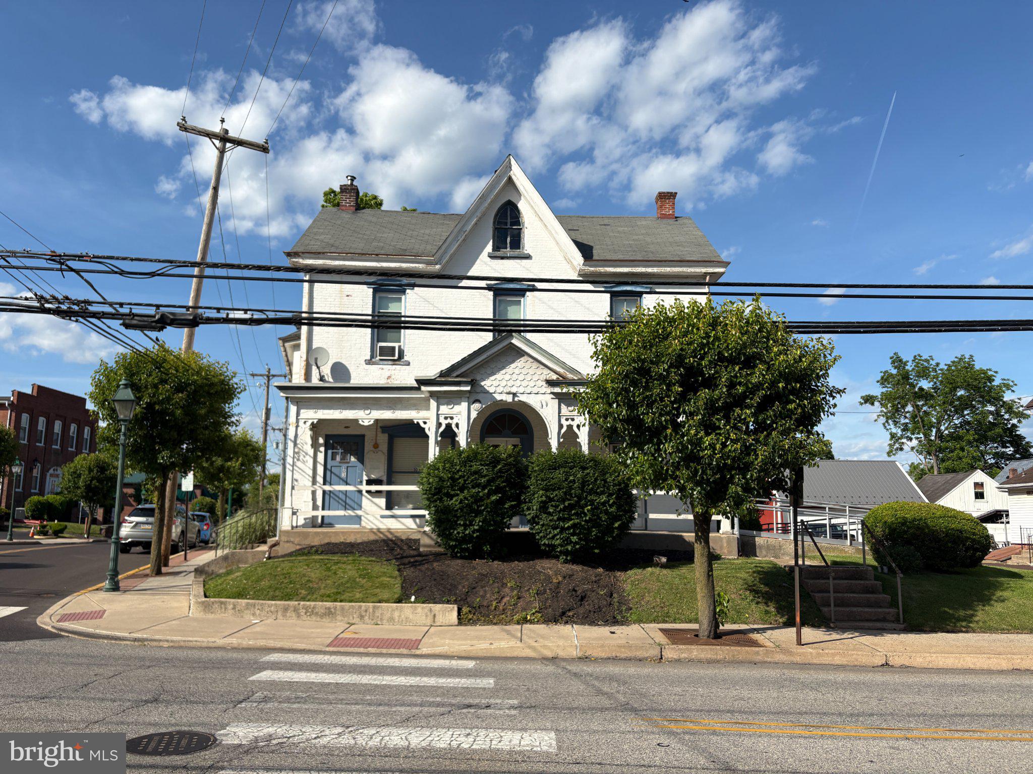Actual lot size is 12,300 sf - opportunity for redevelopment or to own your own office with two apartments providing income. Located in Hatfield Boro C zoning district - allowable uses are many and are attached to the listing. Currently owner-occupied on first floor with medical practice; apartments are on short-term leases.