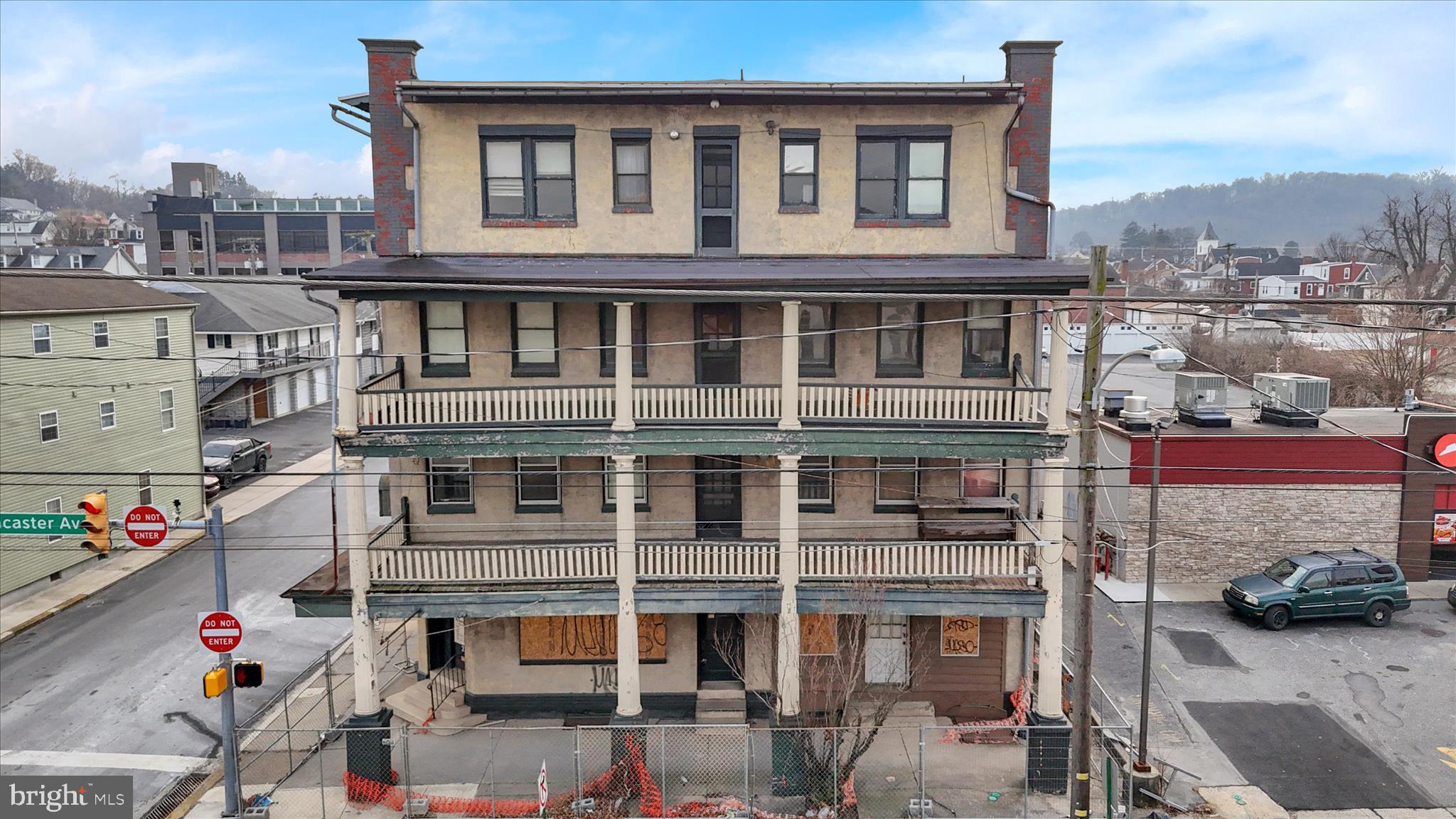 This commercial property in the heart of downtown Shillington offers a prime investment opportunity with a level 0.3-acre lot. Built in 1910, the structure features a mix of durable materials including brick, concrete, and stucco, ensuring longevity and low maintenance. The property is in below-average condition, presenting a chance for value-add renovations that can significantly increase rental income or resale value. Strategically located less than 10 miles from the airport and within a mile of public transportation, it boasts excellent accessibility, enhancing its appeal to potential tenants. Parking options include private garages and surface lots, catering to various business needs. Investors can capitalize on the growing demand for commercial spaces in urban settings, with the potential for strong returns through strategic improvements and leasing. This property is a solid addition to any investment portfolio, offering both immediate and long-term financial benefits. CLEAN Phase I enviromental assessment report.