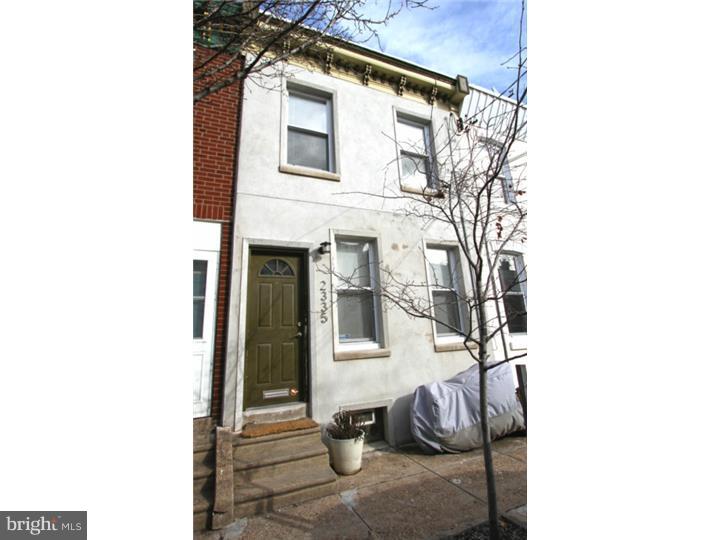 Contemporary 2 bedroom, 2.5 bath located in Fishtown area. . Gleaming oak & tile floors and designer colors throughout. Foyer entrance with slate tile  opens to an open living room /dining room floor plan. Newer kitchen with stainless steel appliances including dishwasher, microwave, stove + fridge, leading to  rear addition w/ laundry center and powder room.  Rear outdoor space w/ a lovely landscaped patio with a  6' fence.   The 2nd floor has master suite with ceiling fan and full private bath, full ceramic tile hall bath and large 2nd bedroom with ceiling fan and three-window bay overlooking the garden. All newer systems including electrical service and fixtures +plumbing.  This home has the best of both worlds with radiator heat and central air!!   Clean, dry basement for storage or studio space.  This is the perfect starter home in a great location.