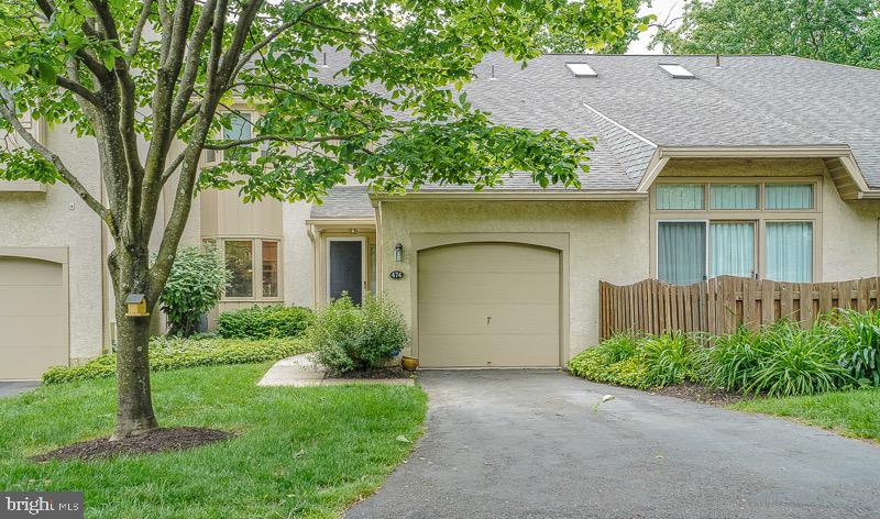 Welcome to 474 Copper Beech Circle in Breyer Woods, an immaculately kept Townhome in pristine condition. Hardwood floors, bay windows, 2 wood burning fireplaces with blowers, skylight, a wonderful eat in kitchen with granite countertops and hand made tiled backsplash really tie the kitchen together. The new porcelain tiled entrance hall floor and powder room lead to the living room w/fireplace, dining room and private deck. The upper level main bedroom suite has a large sitting room and new large soaking tub, a second bedroom, laundry and attic storage complete the top floor. Included in the large lower level is a bedroom/office, bath and family room with outdoor patio space.